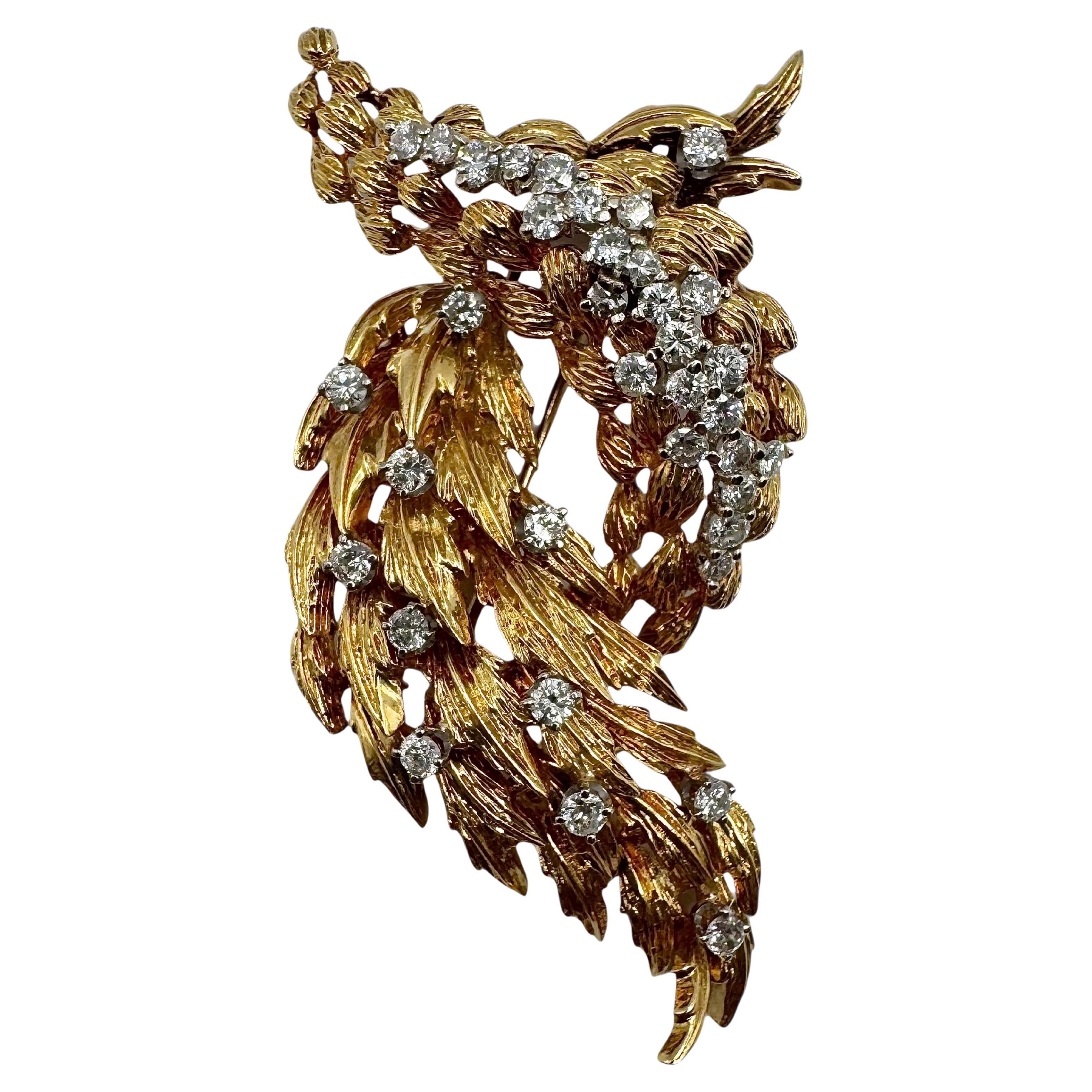 Broche plume vintage en or jaune 18K avec diamants