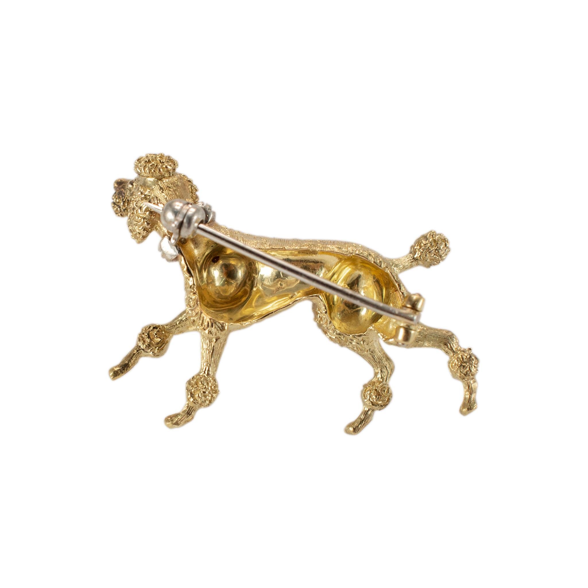 Gender: Ladies 

Metal Type: 18K Yellow Gold

Length: 0.75 inches

Width: 1.25 inches

Weight: 7.68 grams

One lady's 18K yellow gold animal diamond vintage brooch. The metal was tested and determined to be 18K yellow gold. Engraved with 