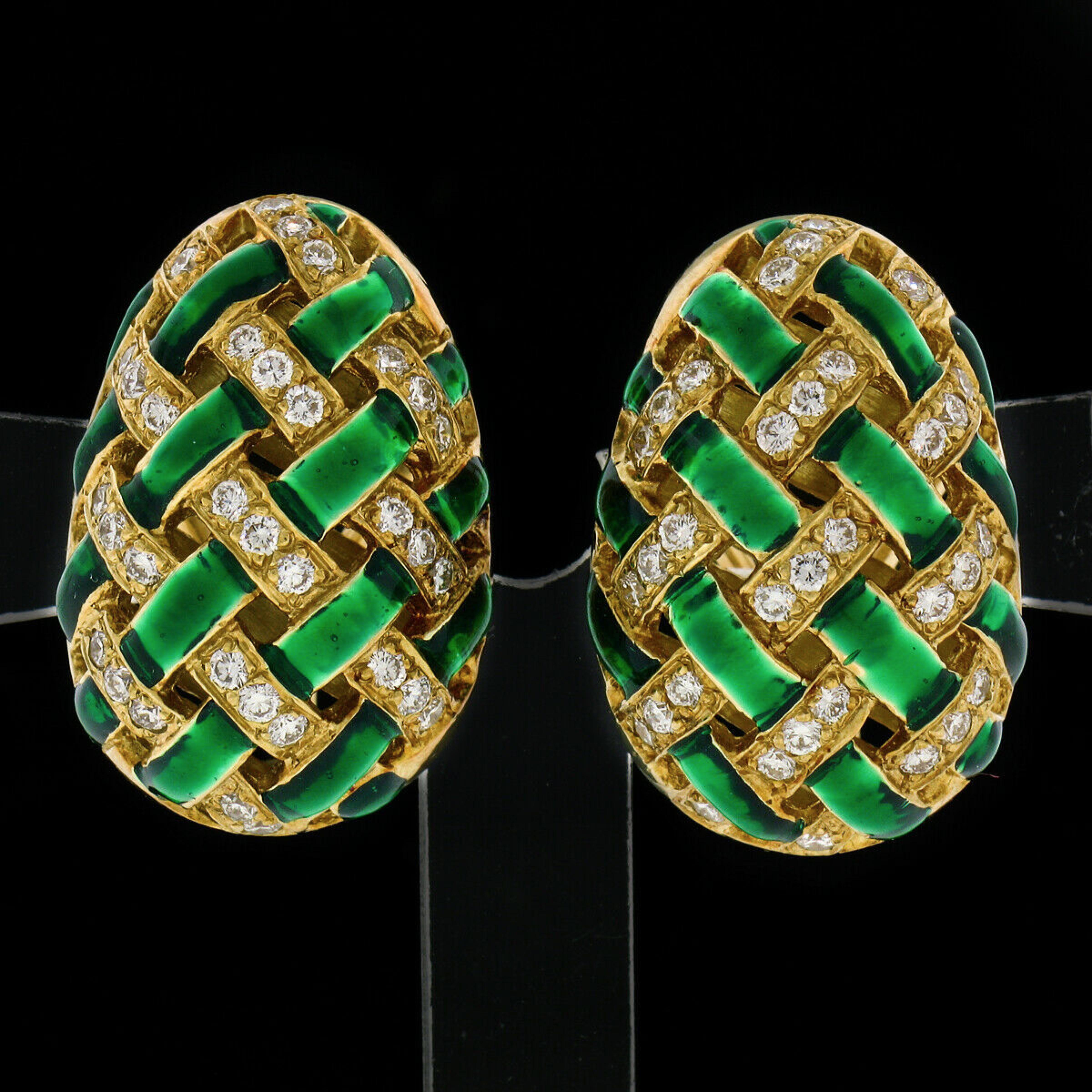 Here we have a fabulous pair of vintage earrings very well crafted in solid 18k yellow gold and decorated neatly with vibrant green enamel and drenched with top quality diamonds throughout. The earrings are an egg shape with open braided basket