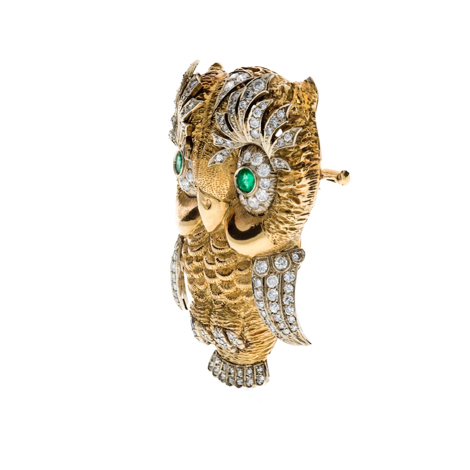 Beautiful owl brooch of significant weight and size encrusted with diamonds and set with green emerald eyes. You will fall in love with this adorable creature that has a cute look in her eyes. 

Diamonds: 1.75 carats

About 2.25 inches long. 

From