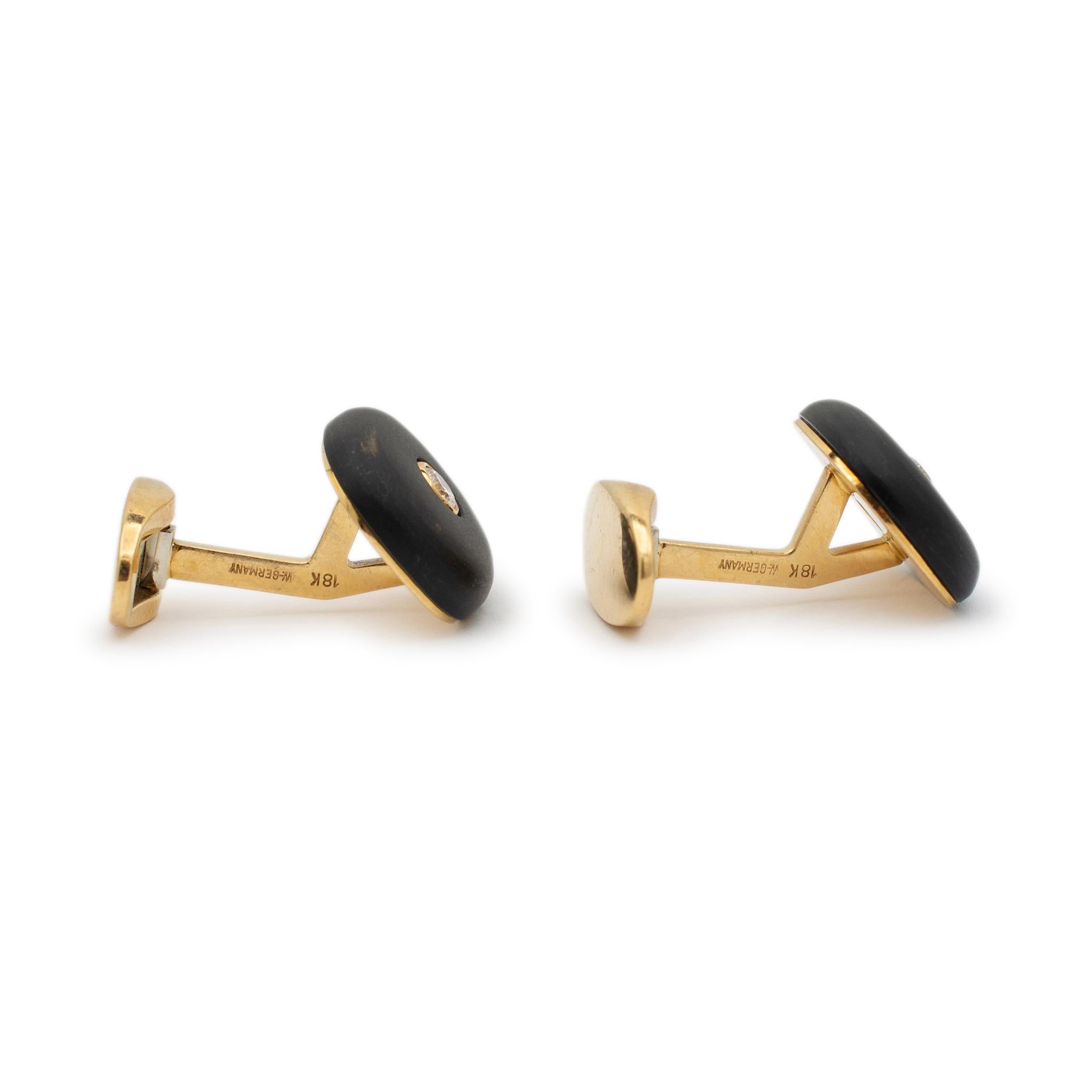 Metal Type: 18K Yellow Gold

Length: 0.75 inches

Width: 17.15 mm

Weight: 15.90 grams

18K yellow gold diamond cufflinks. Engraved with 