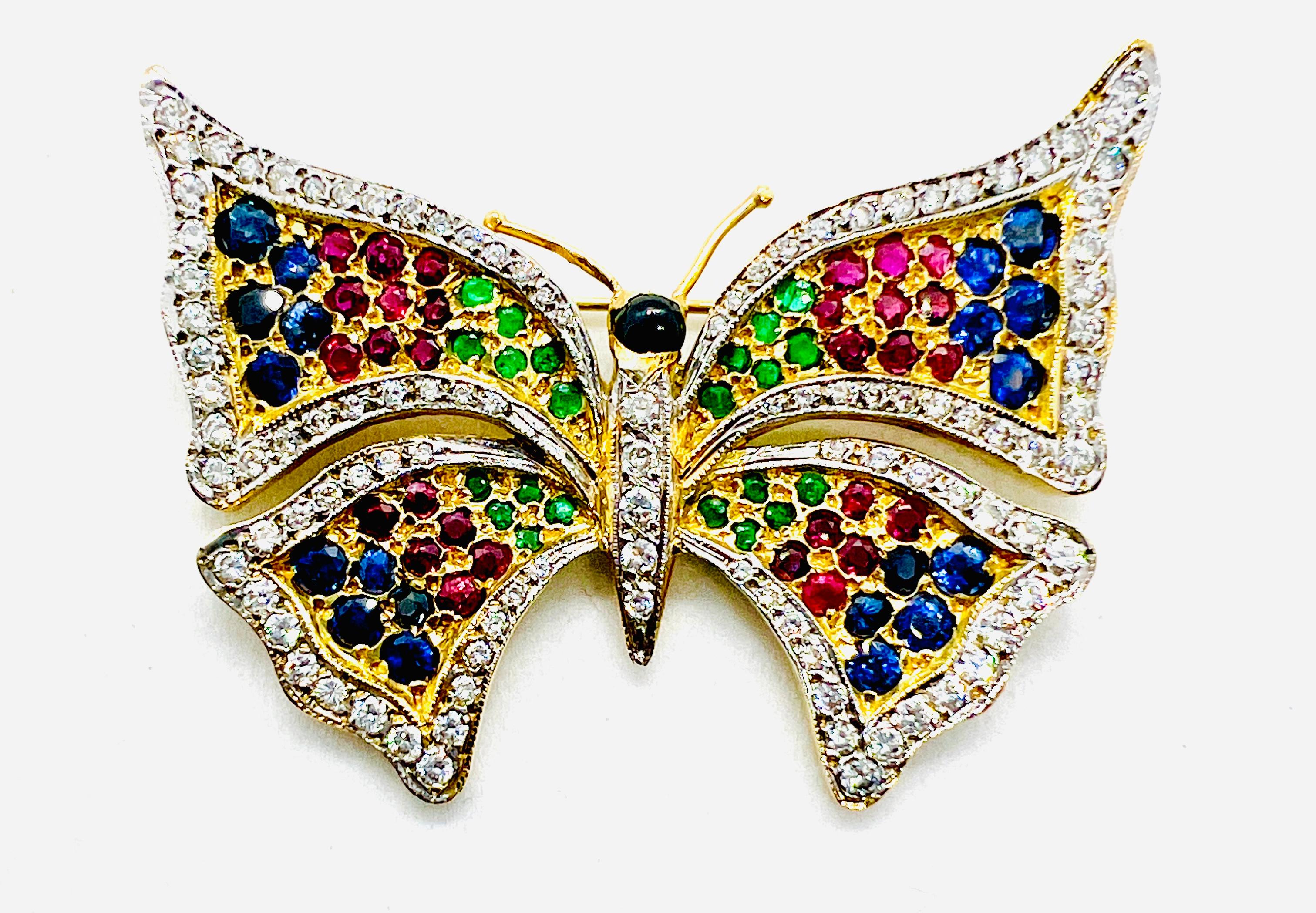 This is an absolutely stunning brooch! This piece is not signed but the craftsmanship is undeniable. This is a vintage Butterfly Brooch that is made in 18K yellow gold. It measures 60mm by 48mm (2.5 inches by 2 inches) and it weighs 26.5 grams. This