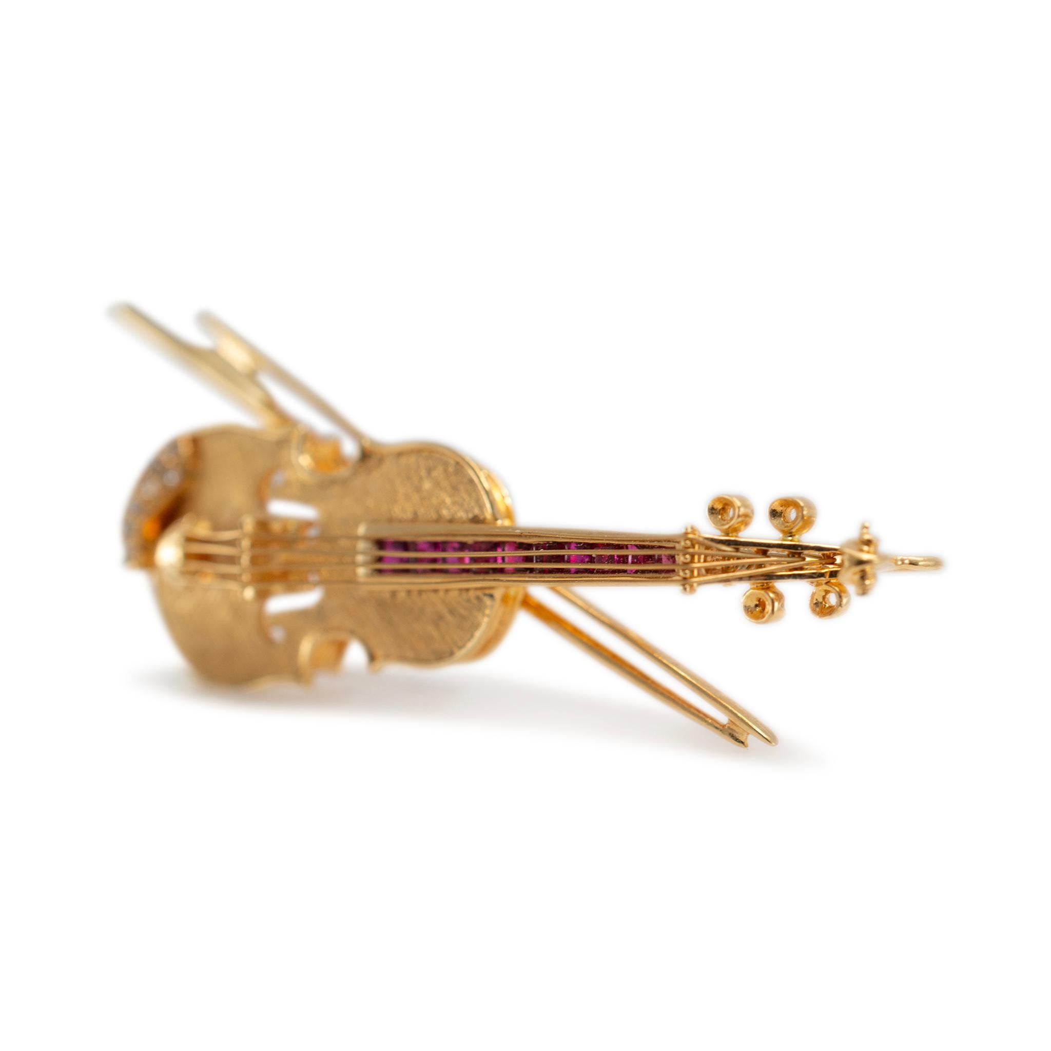 Gender: Unisex

Metal Type: 18K Yellow Gold

Length: 2.25 inches

Width: 15.50 mm

Weight: 9.91 grams

18K Yellow Gold diamond and sapphire vintage brooch. The metal was tested and determined to be 18K yellow gold.

Vintage in excellent condition.