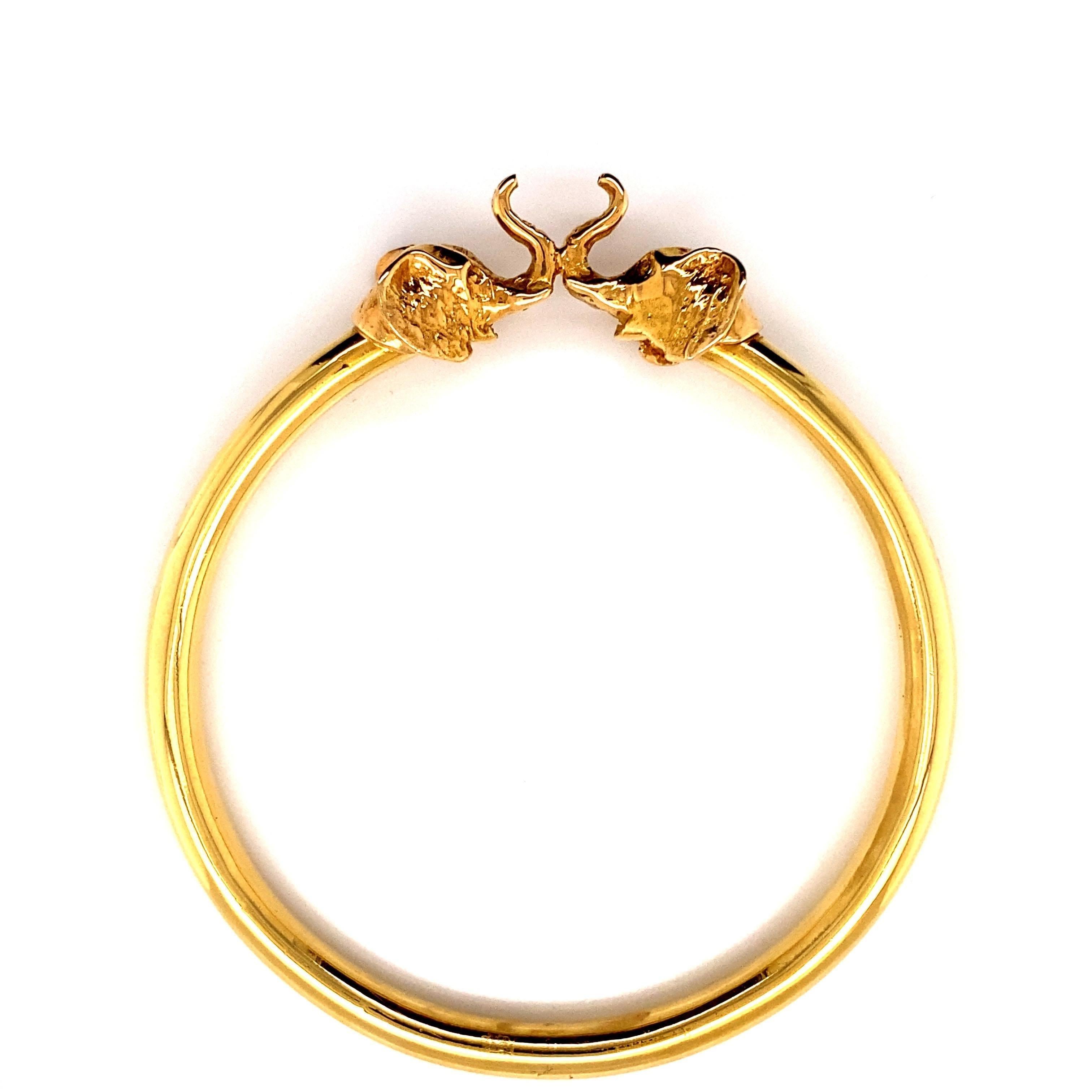 Contemporary Vintage 18K Yellow Gold Elephant Bangle Bracelet For Sale