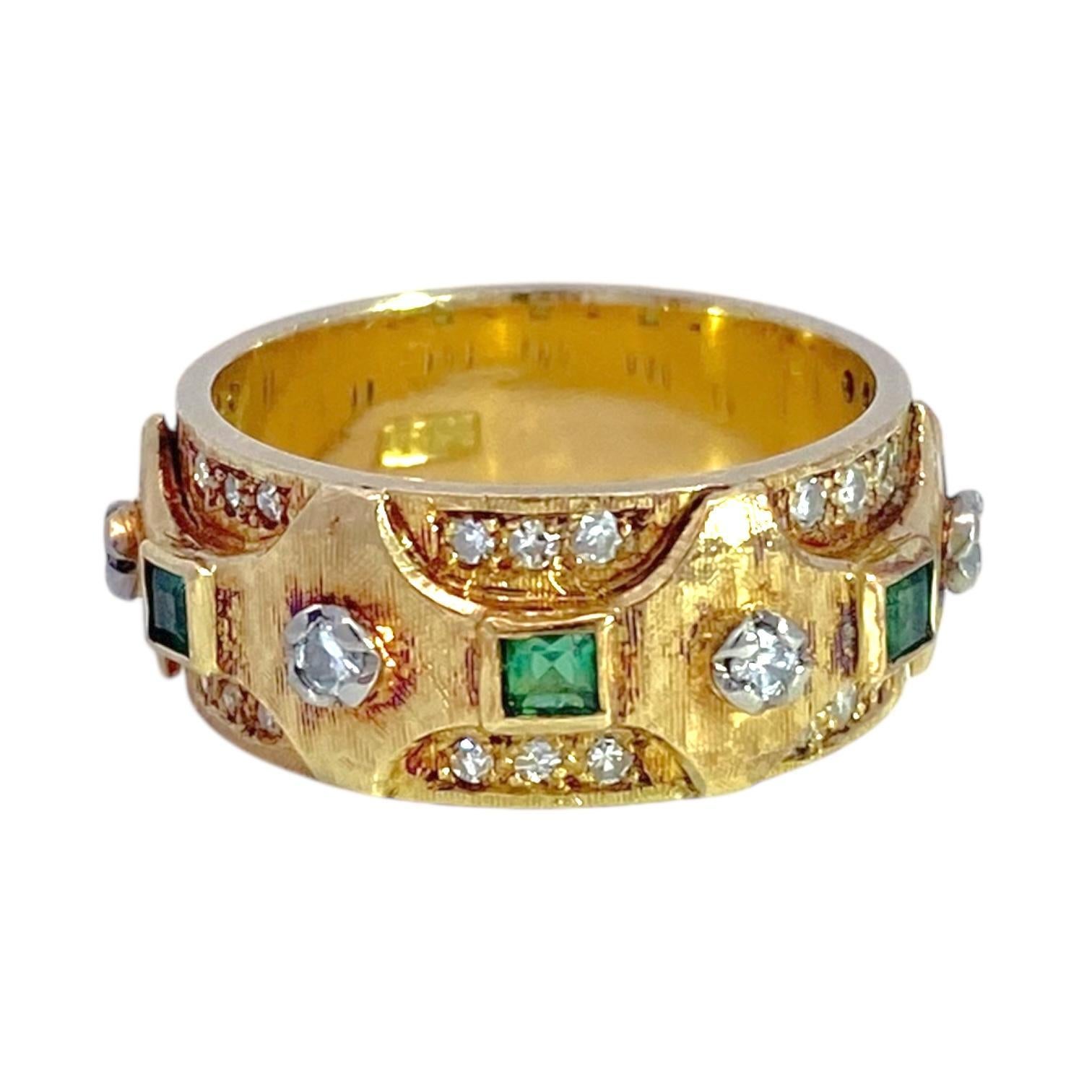 Crafted in 18k yellow gold, the ring features a textured finish with bezel set square-cut green emeralds and bead set round white diamonds. The emeralds are set in a geometric pattern, complemented by the sparkle of the diamonds. The original patina