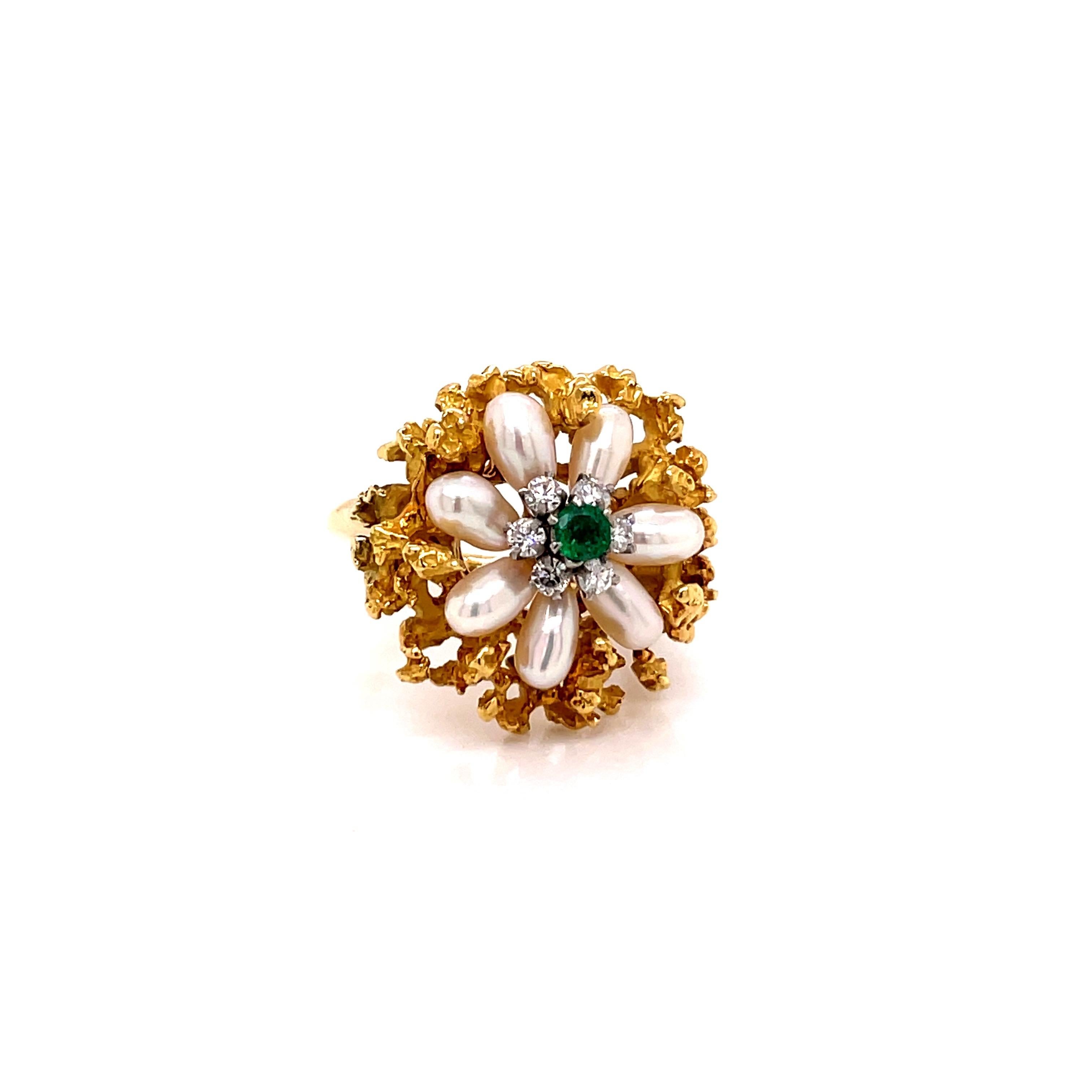 Vintage 18K Yellow Gold Emerald, Pearl and Diamond Flower Ring - The ring us set with one genuine emerald weighing about .16ct with very fine green color. The emerald is surrounded by 6 round brilliant diamonds weighing approximately .25ct with G -