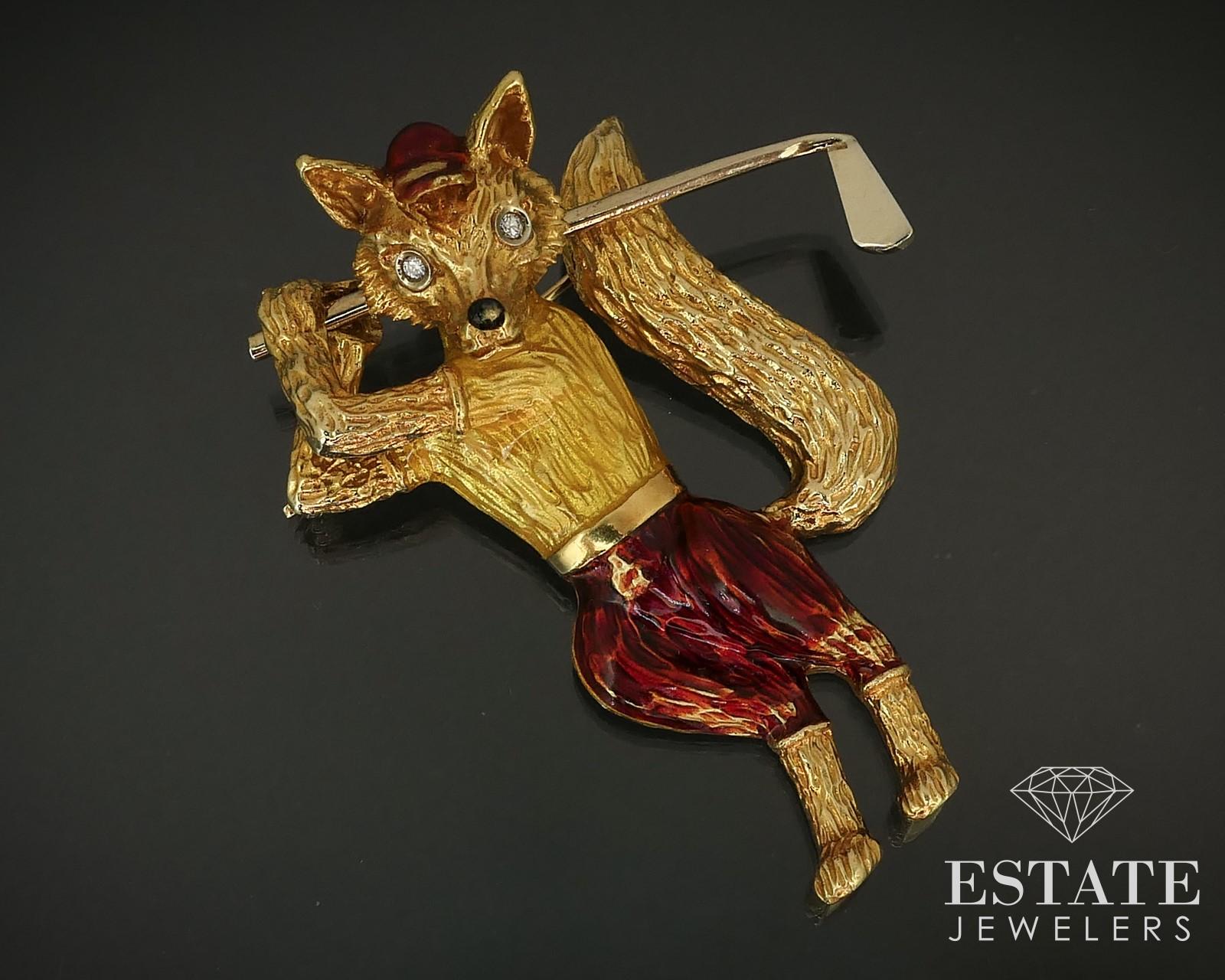Beautiful vintage brooch featuring a very detailed fox golfing. Red and yellow enameling as the clothes and natural diamond eyes! Approximately .06ctw of diamonds with VS in clarity and G in color. Brooch measures 2-1/8