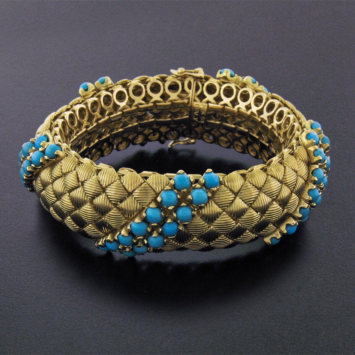 This gorgeous vintage bracelet was crafted in solid 18k yellow gold and features very unique textured square patterns that structure the solid and bold design. Prong set diagonally are dual rows of 70 genuine turquoise stones displaying very
