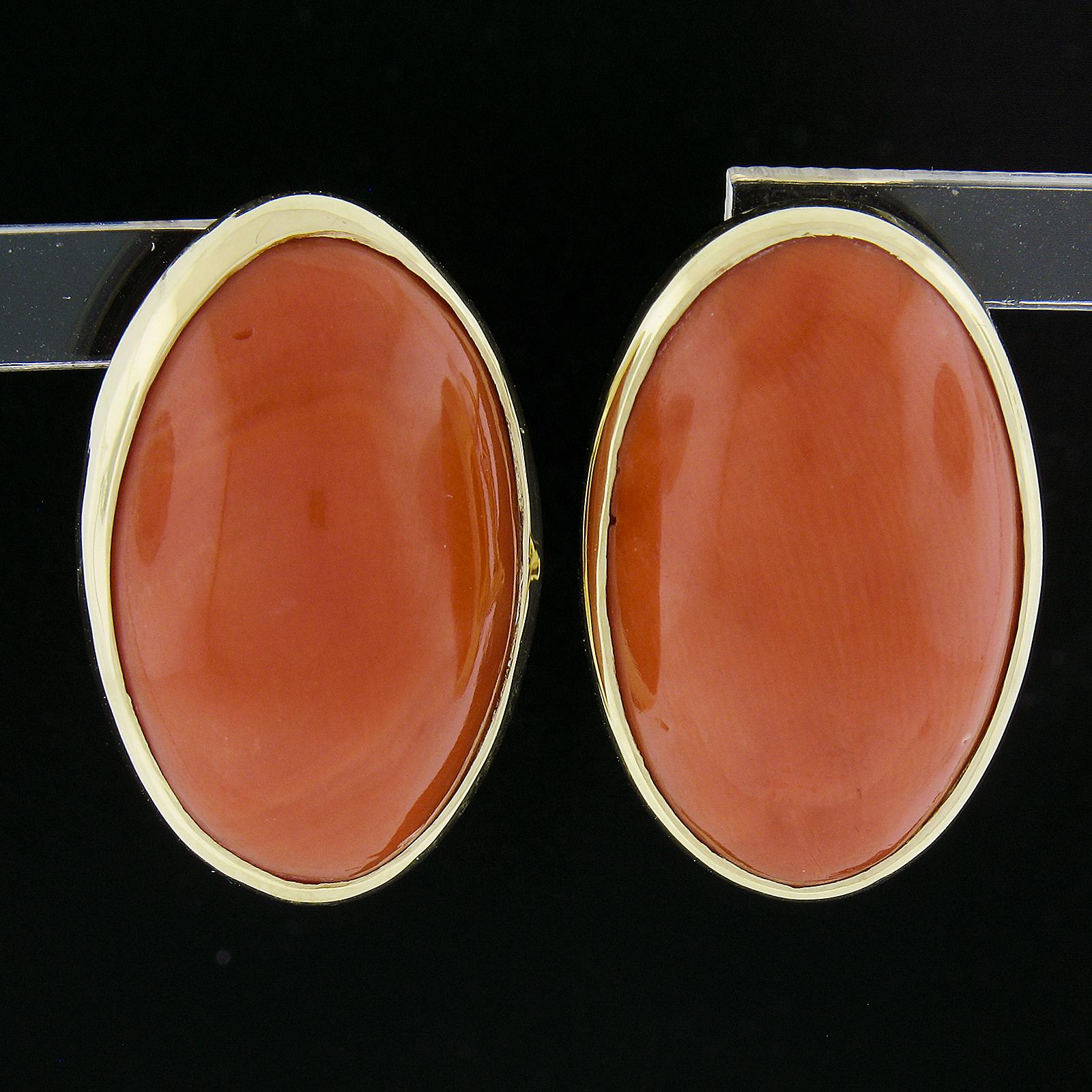 Oval Cut Vintage 18k Yellow Gold GIA Graded 28.94ctw Oval Cabochon Coral Omega Earrings For Sale