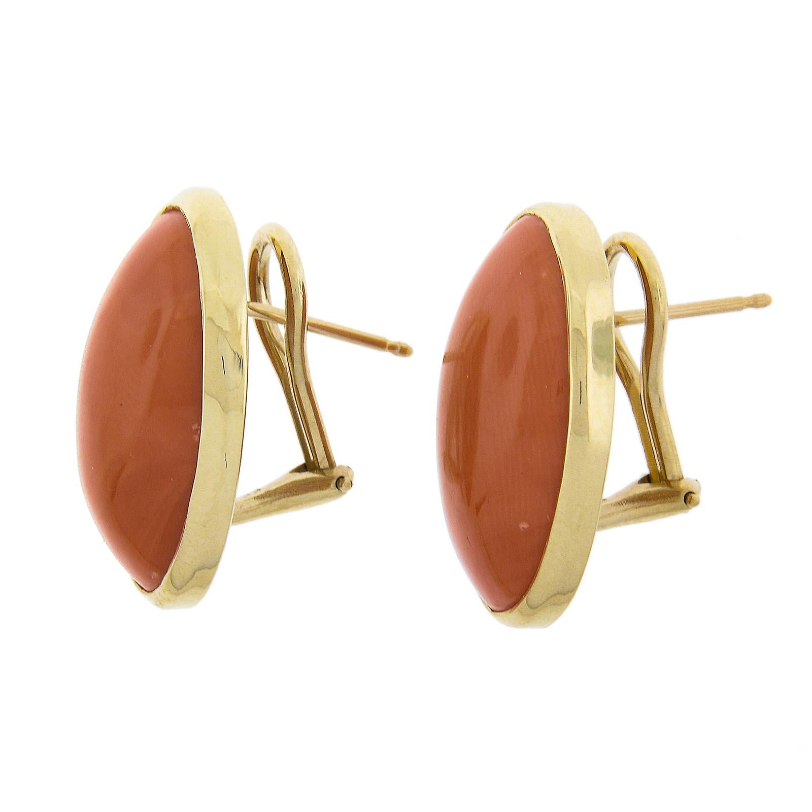 Vintage 18k Yellow Gold GIA Graded 28.94ctw Oval Cabochon Coral Omega Earrings In Excellent Condition For Sale In Montclair, NJ