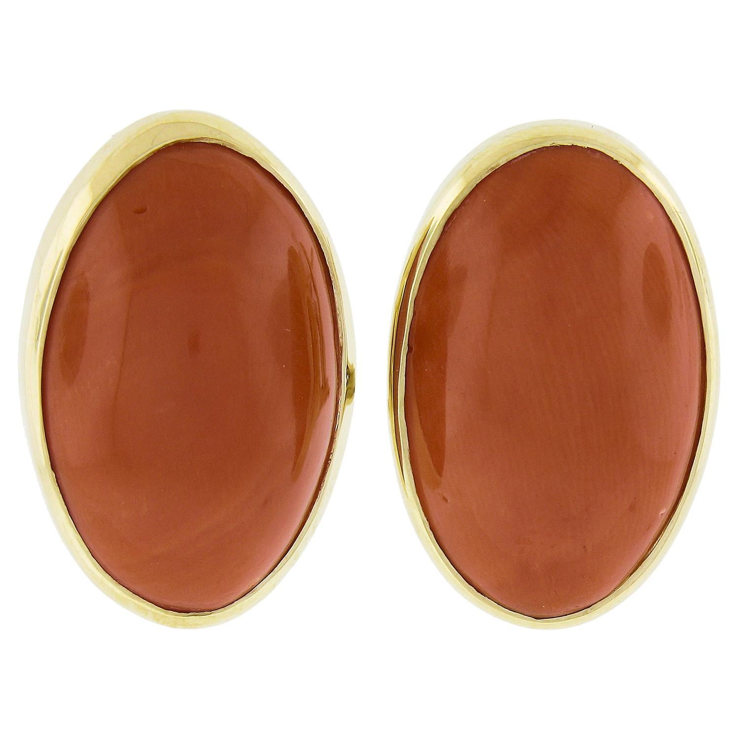 Vintage 18k Yellow Gold GIA Graded 28.94ctw Oval Cabochon Coral Omega Earrings For Sale