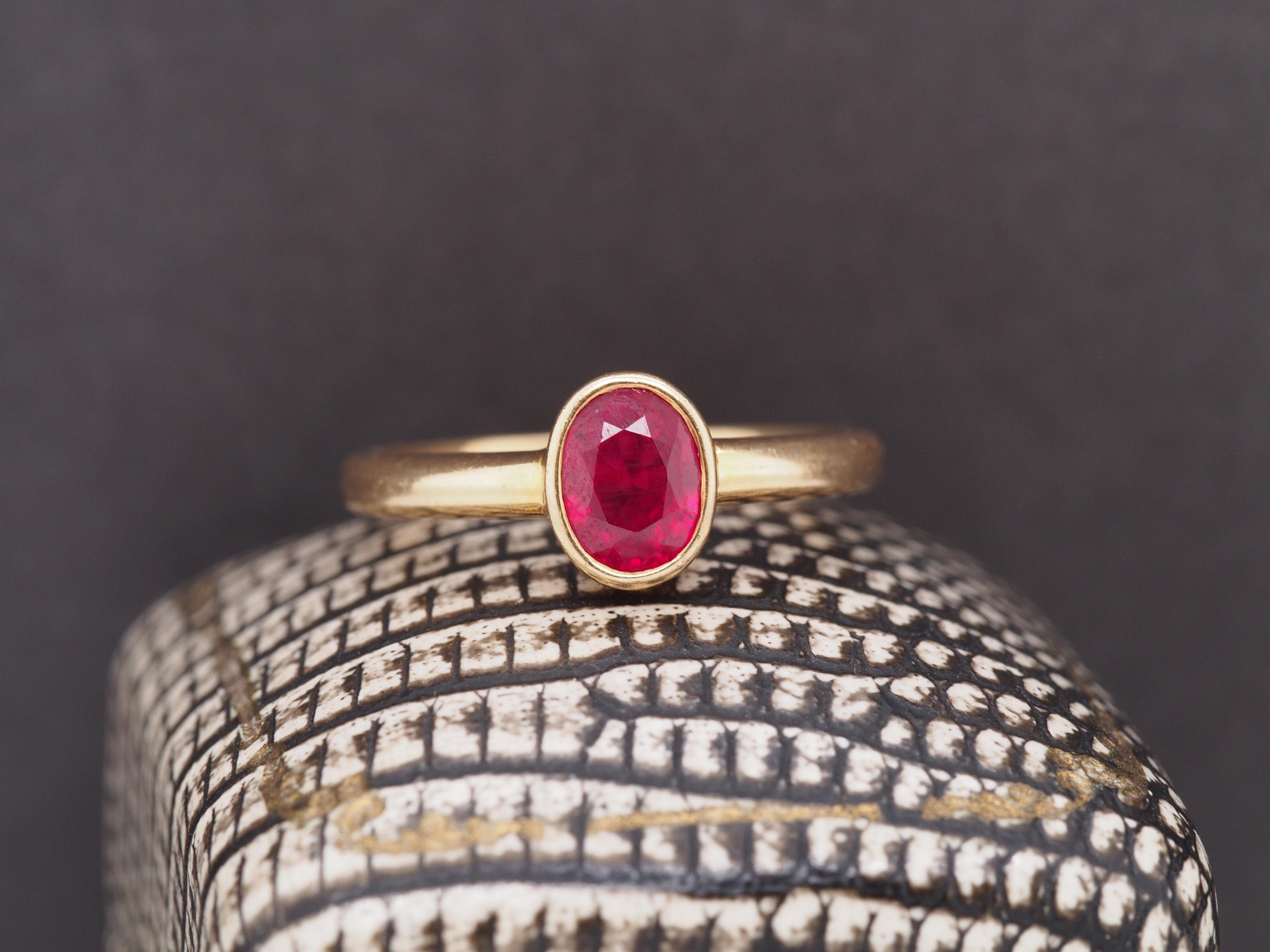 Year: 1950s
Item Details:
Ring Size: 6.5
Metal Type: 18K Yellow Gold [Hallmarked, and Tested]
Weight: 3.7 grams
Ruby Details:
GIA Report number: 7235084065
Color: VIVID RED, PIGEON BLOOD (Highest grade of color a ruby can receive)
Natural