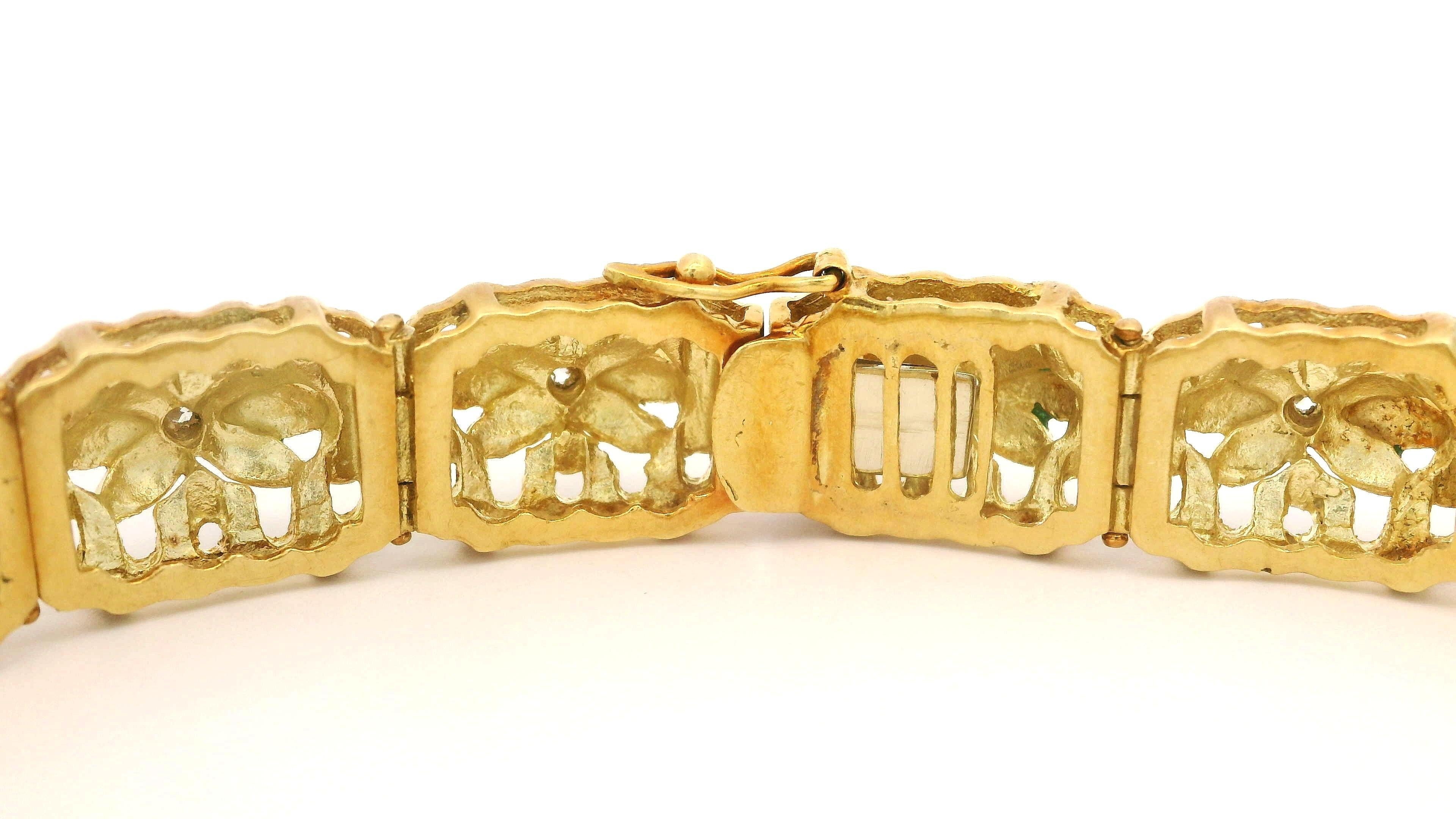 --Stone(s):--
(13) Natural Genuine Diamonds- Round Brilliant Cut - Bezel Set - F/G Color - VS2-SI2 Clarity - 0.78ctw (approx.)

Material: 18K Solid Yellow Gold (tested) w/ Green Enamel Work
Weight: 32.31 Grams
Size: Measures 7 Inches Next to a