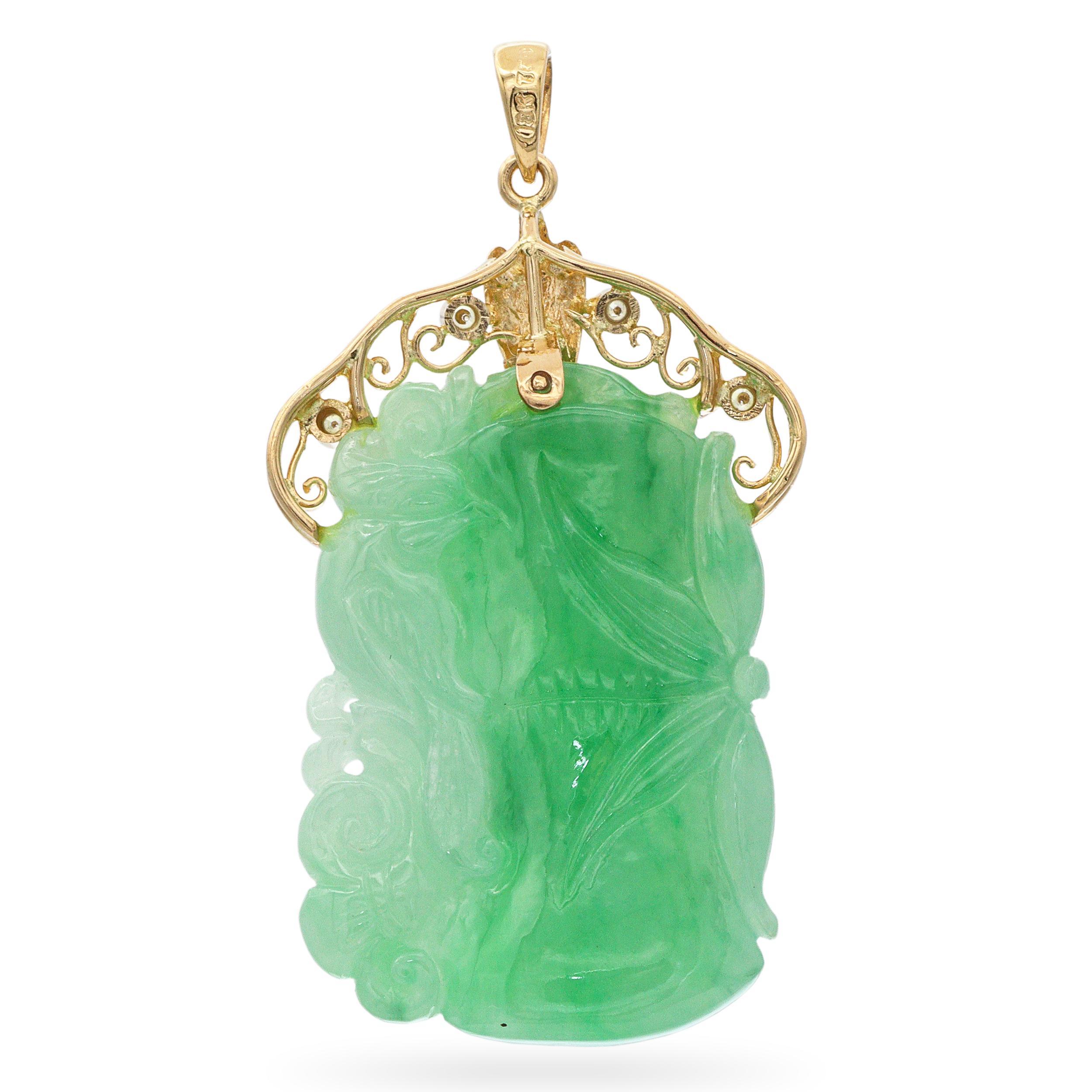Rich in symbolism and artisan beauty, this vintage pendant features a striking piece of natural green jade intricately hand-carved with a serene scene of a bird among bamboo leaves—representing resilience, harmony, and freedom in Chinese culture.