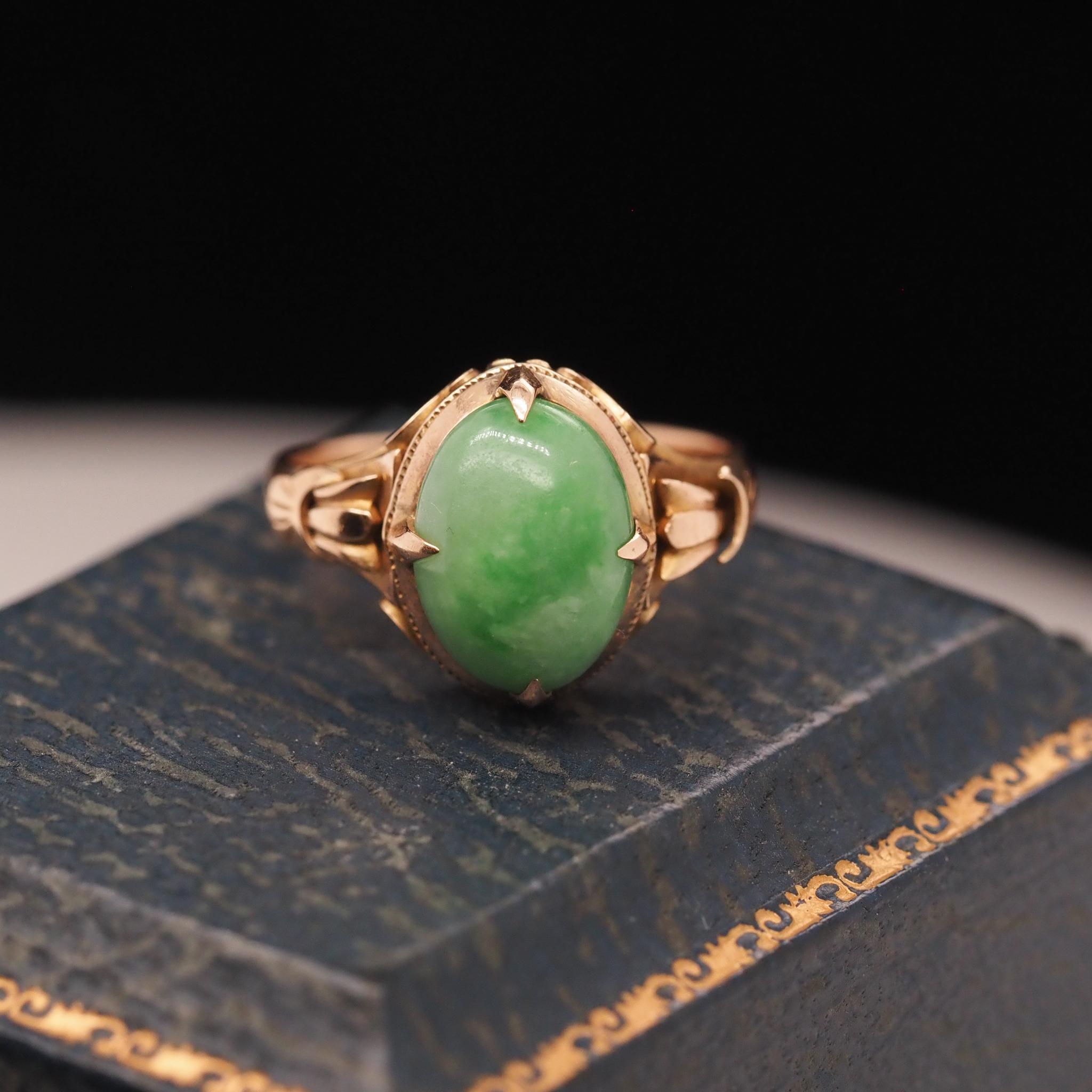 Year: 1940s
Item Details:
Ring Size: 7.5 (Sizable)
Metal Type: 18k Yellow Gold [Hallmarked, and Tested]
Weight: 4.3 grams
Jade Details: 12.5mm x 8.5mm
Band Width: 2.5mm
Condition: Excellent
Era: Vintage