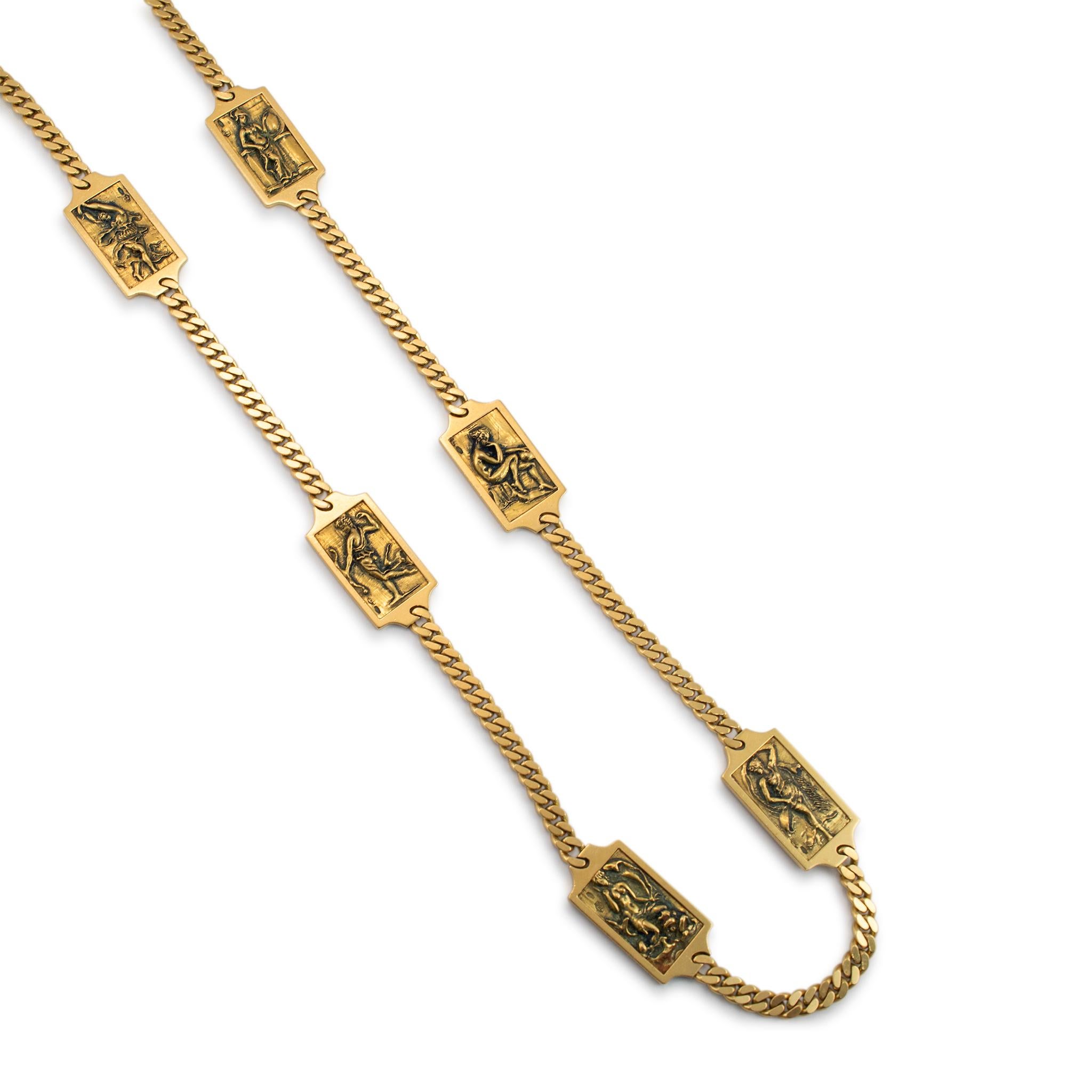 Gender: Ladies

Metal Type: 18K Yellow Gold

Length: 34.00 inches

Width: 18.80 mm tapering to 5.90 mm

Weight: 162.53 grams

One hand forged textured 18K yellow gold vintage station, rectangular curb link chain.  The metal was tested and determined