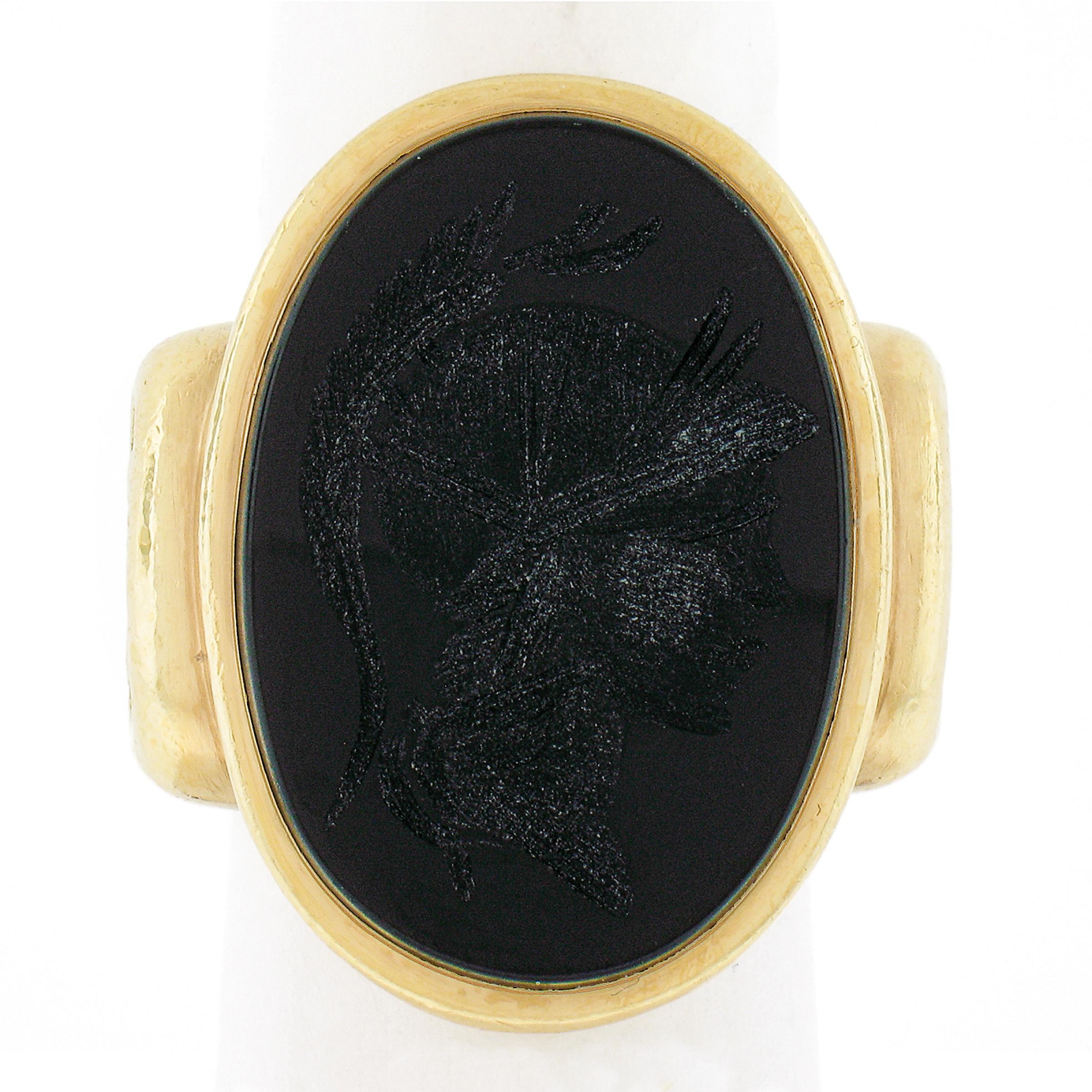 --Stone(s):--
(1) Natural Genuine Black Onyx - Oval Cut w/ Carved Intaglio Cameo - Bezel Set - Solid Black Color - 24.7x17.4mm (approx.)

Material: Solid 18K Yellow Gold
Weight: 29.32 Grams
Ring Size: 6.0 (Fitted on a finger. We can custom size this