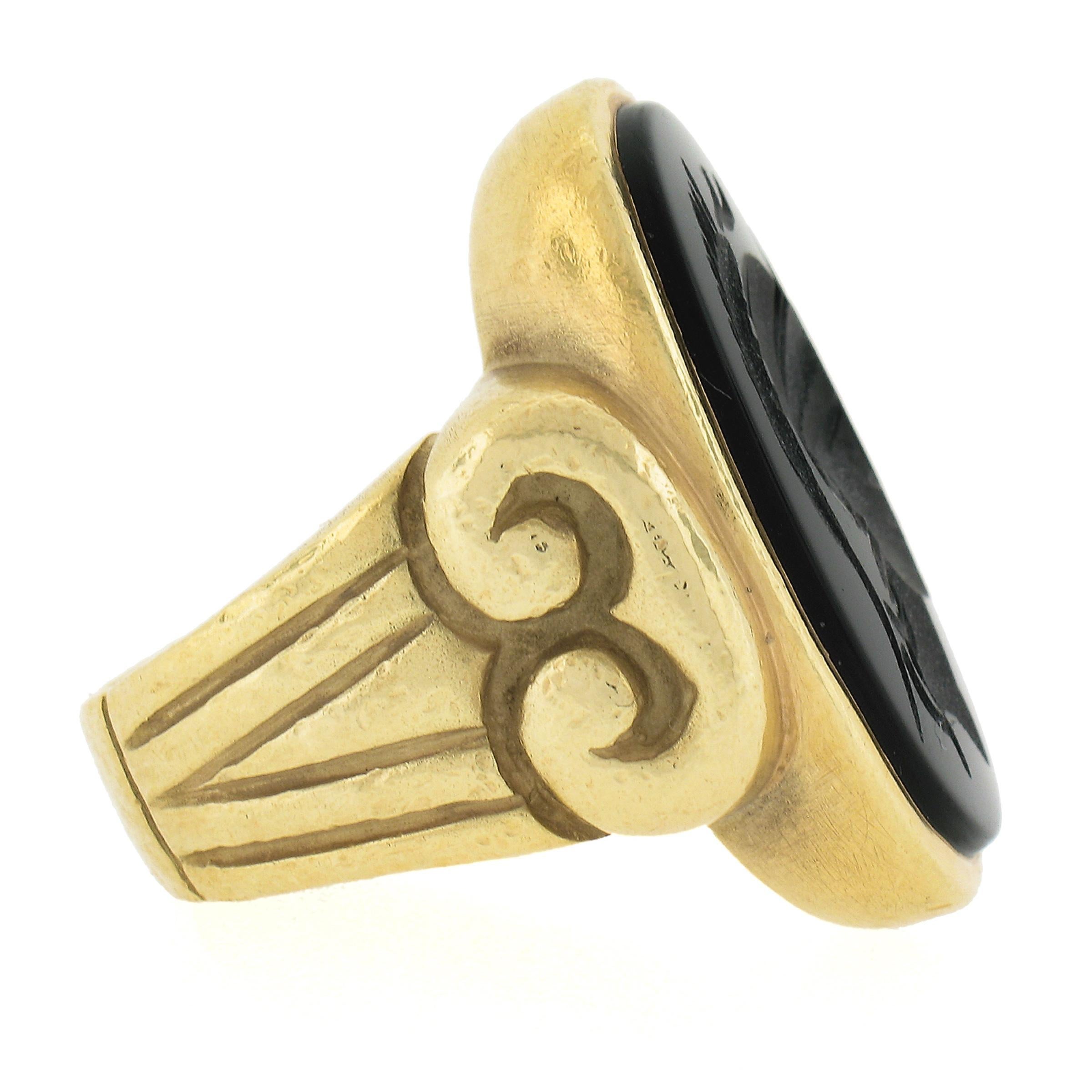 Vintage 18K Yellow Gold Large Oval Black Onyx Carved Intaglio Trojan Heavy Ring In Good Condition For Sale In Montclair, NJ