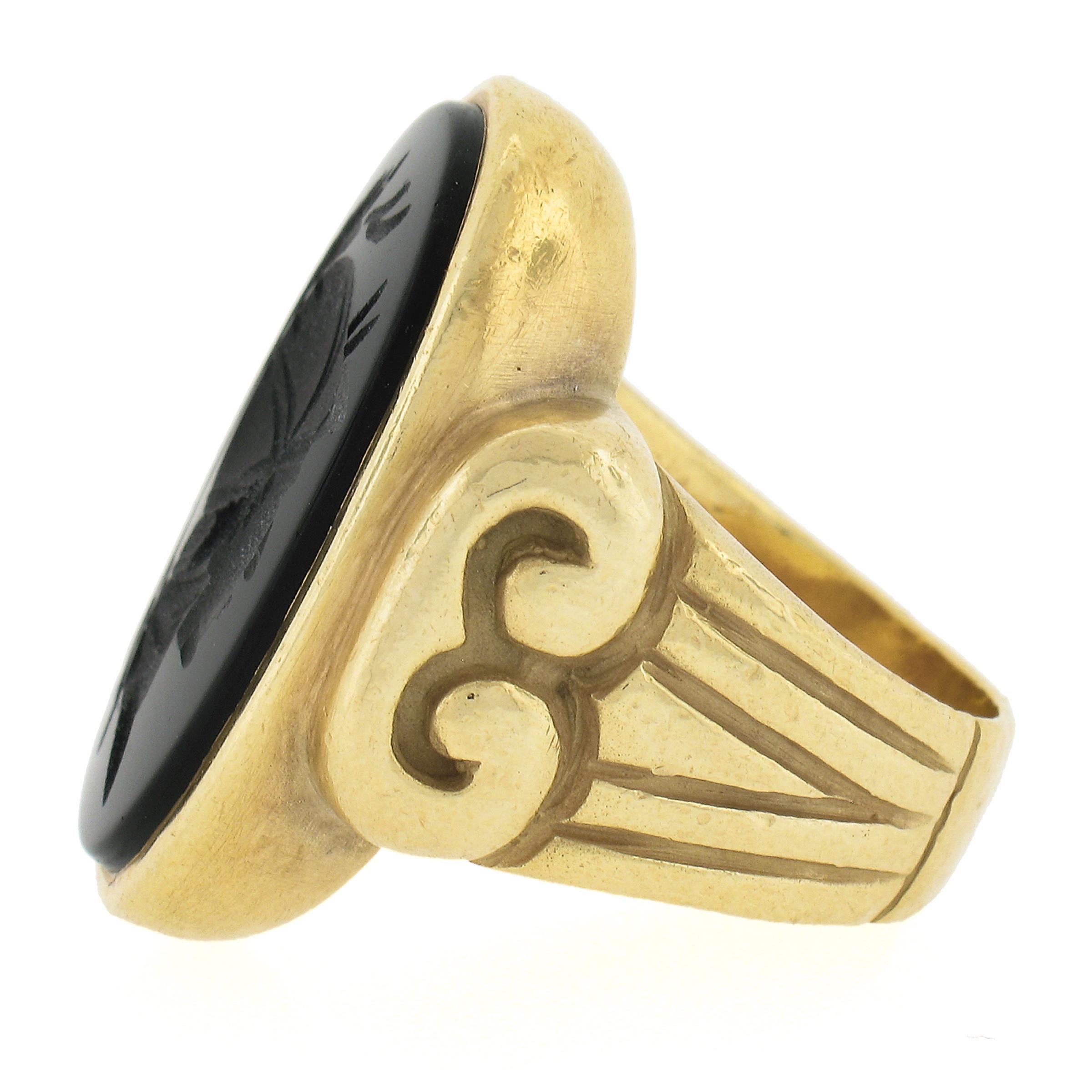 Women's or Men's Vintage 18K Yellow Gold Large Oval Black Onyx Carved Intaglio Trojan Heavy Ring For Sale