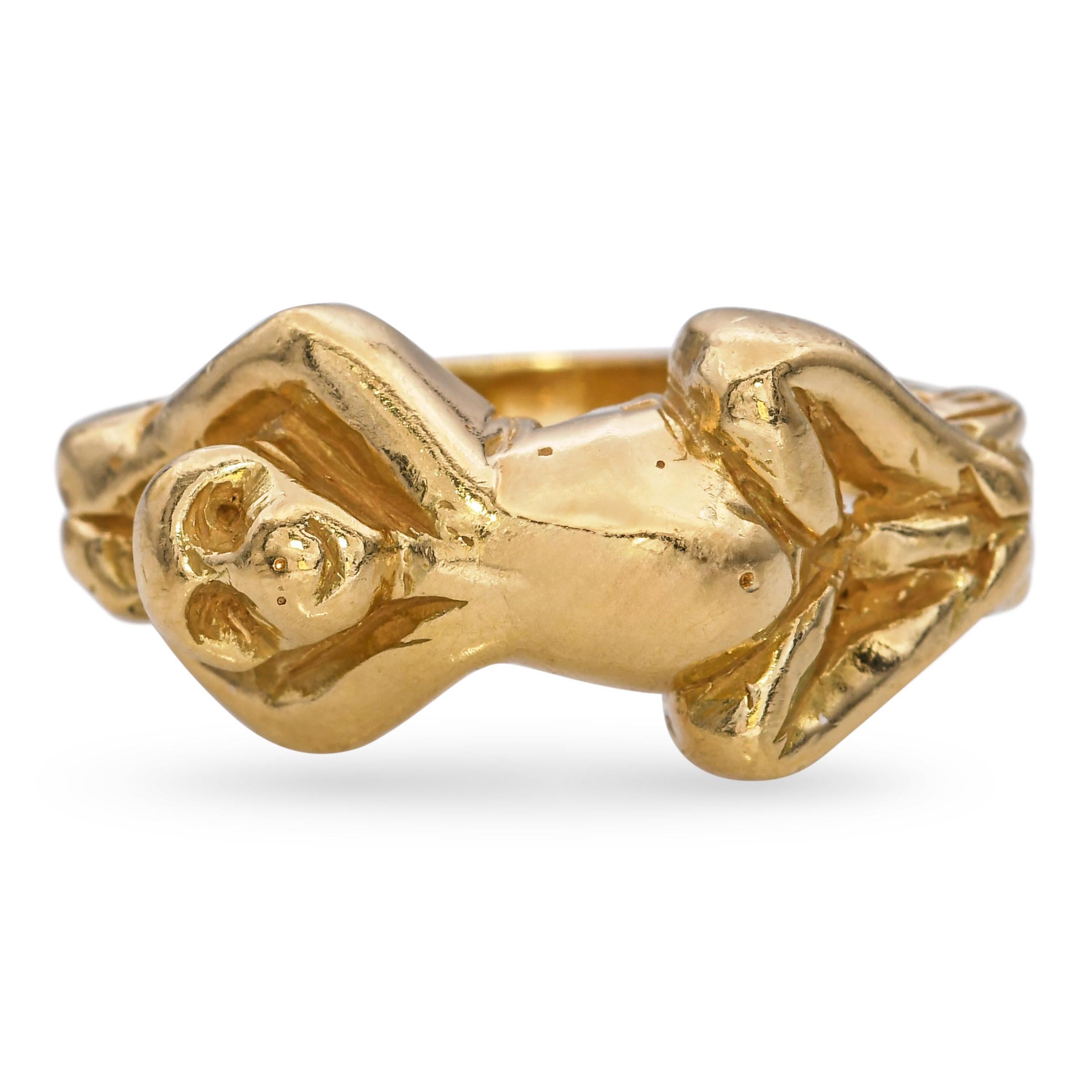 This playful vintage ring is crafted in 18k yellow gold and features a finely detailed monkey motif. The intricate design captures the whimsical character of the animal, showcasing exceptional craftsmanship. Its warm gold finish adds a luxurious