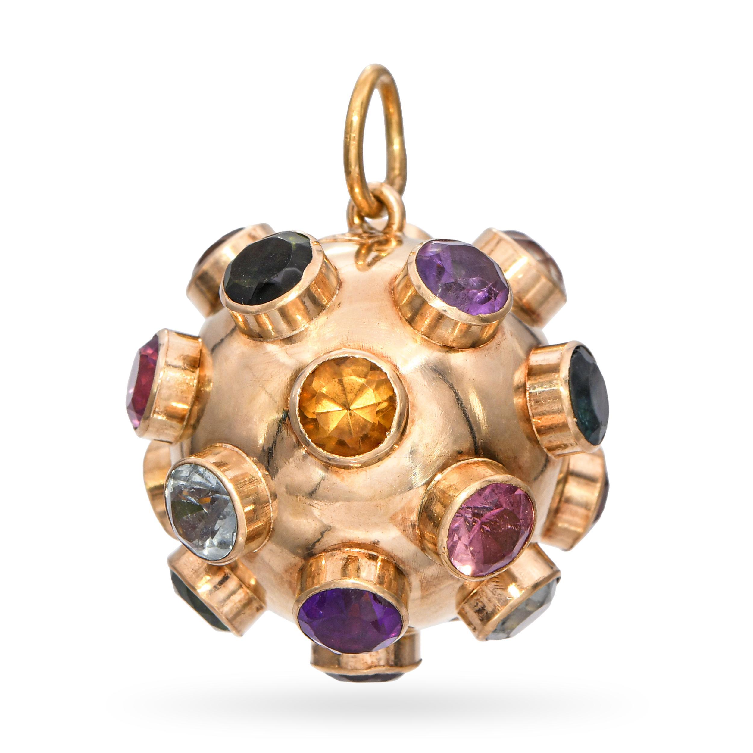 Ce pendentif Sputnik vintage est fabriqué en or jaune 18 carats et serti d'un ensemble de pierres précieuses rondes vibrantes rayonnant vers l'extérieur dans un design frappant d'inspiration atomique. Chaque pierre précieuse - généralement une