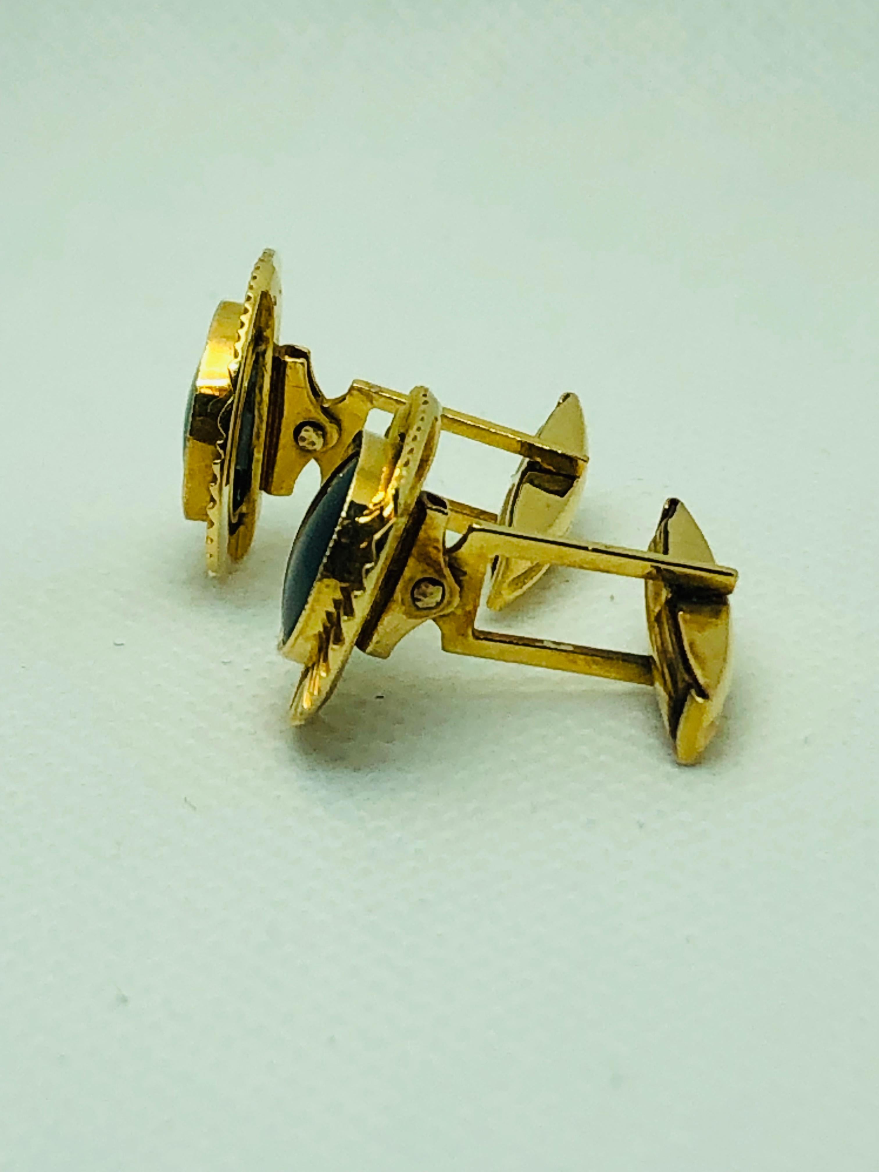 Contemporary Vintage 18 Karat Yellow Gold and Onyx Oval Cufflinks