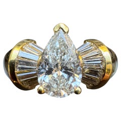 Vintage 18K Yellow Gold Pear-Shape Diamond 
Tapered Baguette Ring