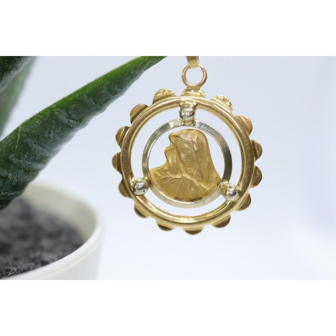 Vintage from the 1990s
Materials: Gold

Style: Mid-century

Magnificent Pendant. You will not see one like it anywhere else.

Virgin Mary in as beautiful frame

Pendant is tested at 18k and marked 750 Italy

Details
Total weight 2.2 grams
22mm