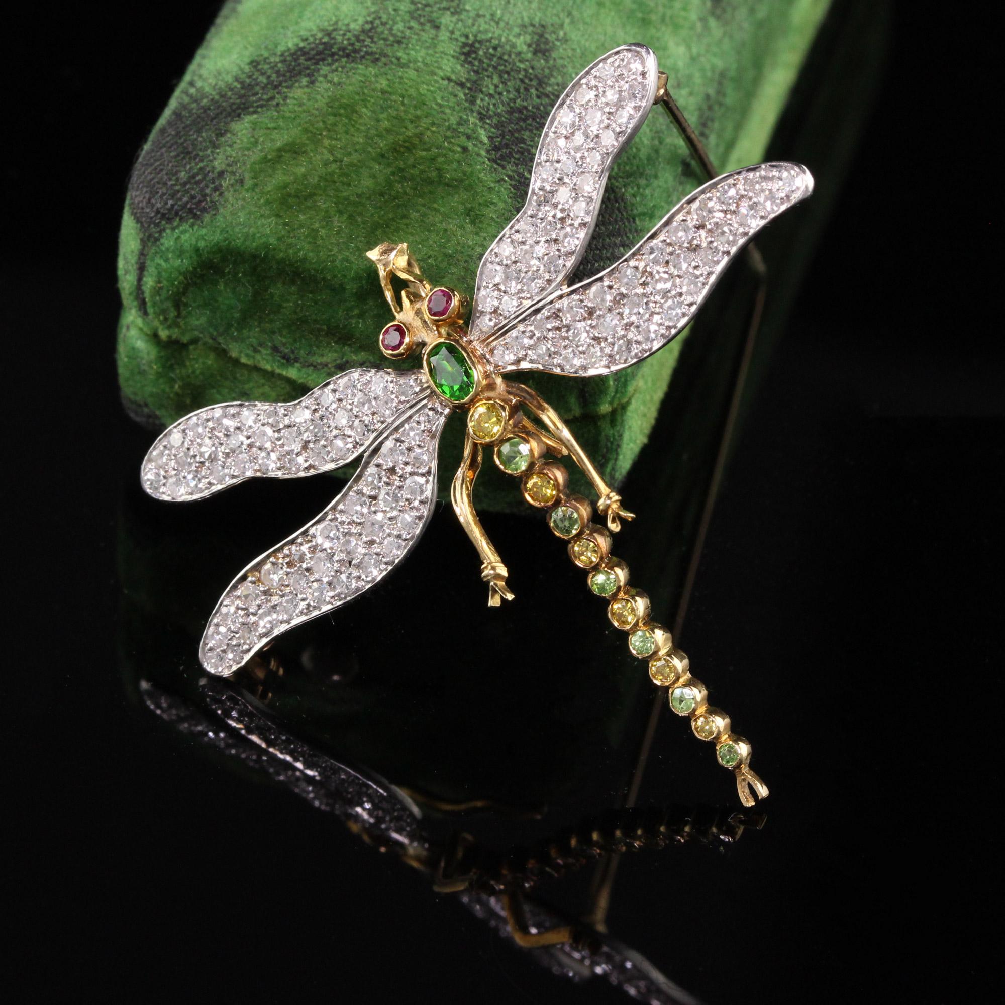 Gorgeous Vintage 18K Yellow Gold Platinum Diamond and Demantoid Garnet Dragonfly Pin. This fabulous dragonfly pin has single cut diamonds all over its wings and a beautiful green Demantoid garnet on its head.

Item #P0118

Metal: 18K Yellow Gold and