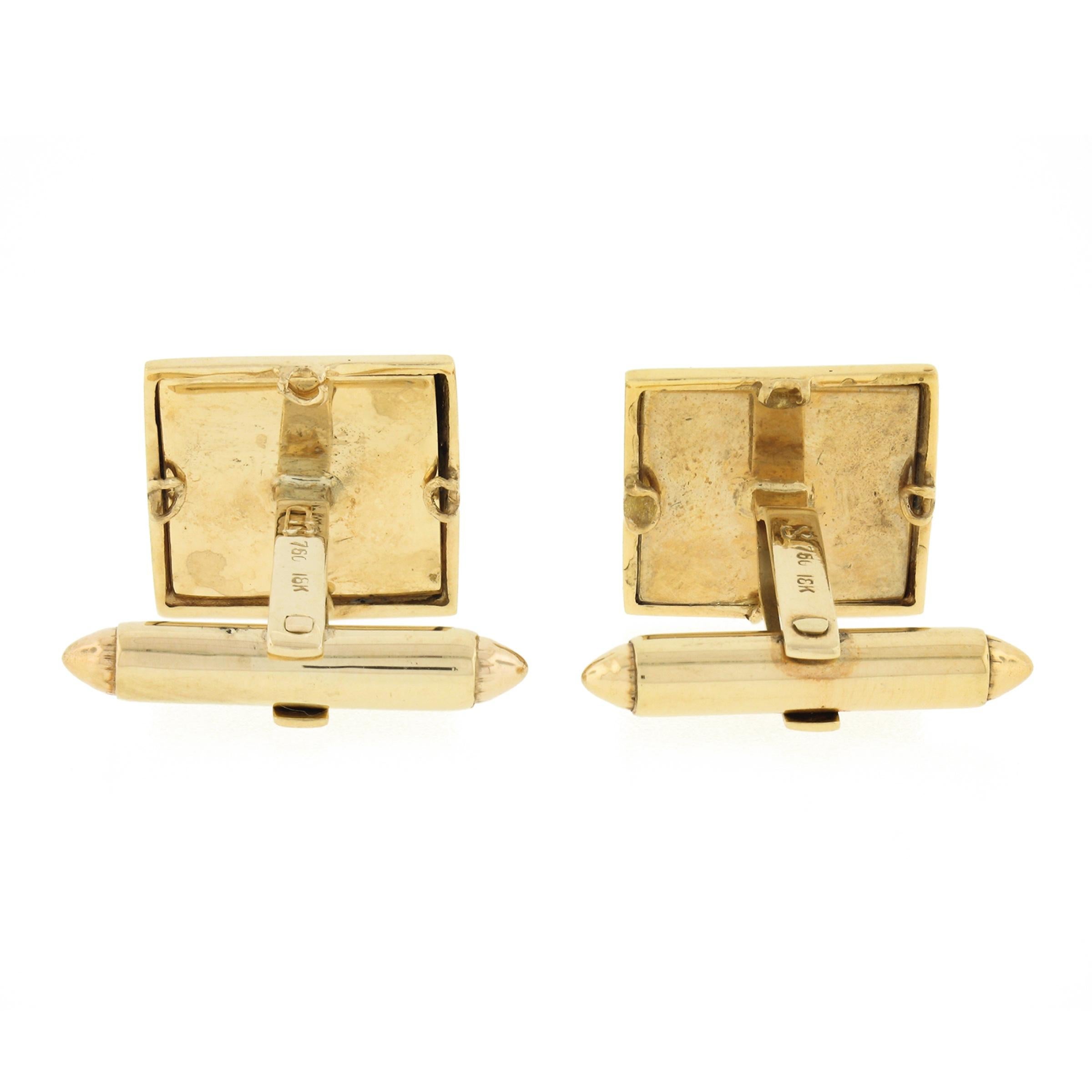 These sharp vintage cuff links are crafted in solid 18k yellow gold and feature a square shaped design which carries a fine black onyx stone at its center. Each of the polished gemstones has a wonderful pyramid cut and perfectly set and framed by