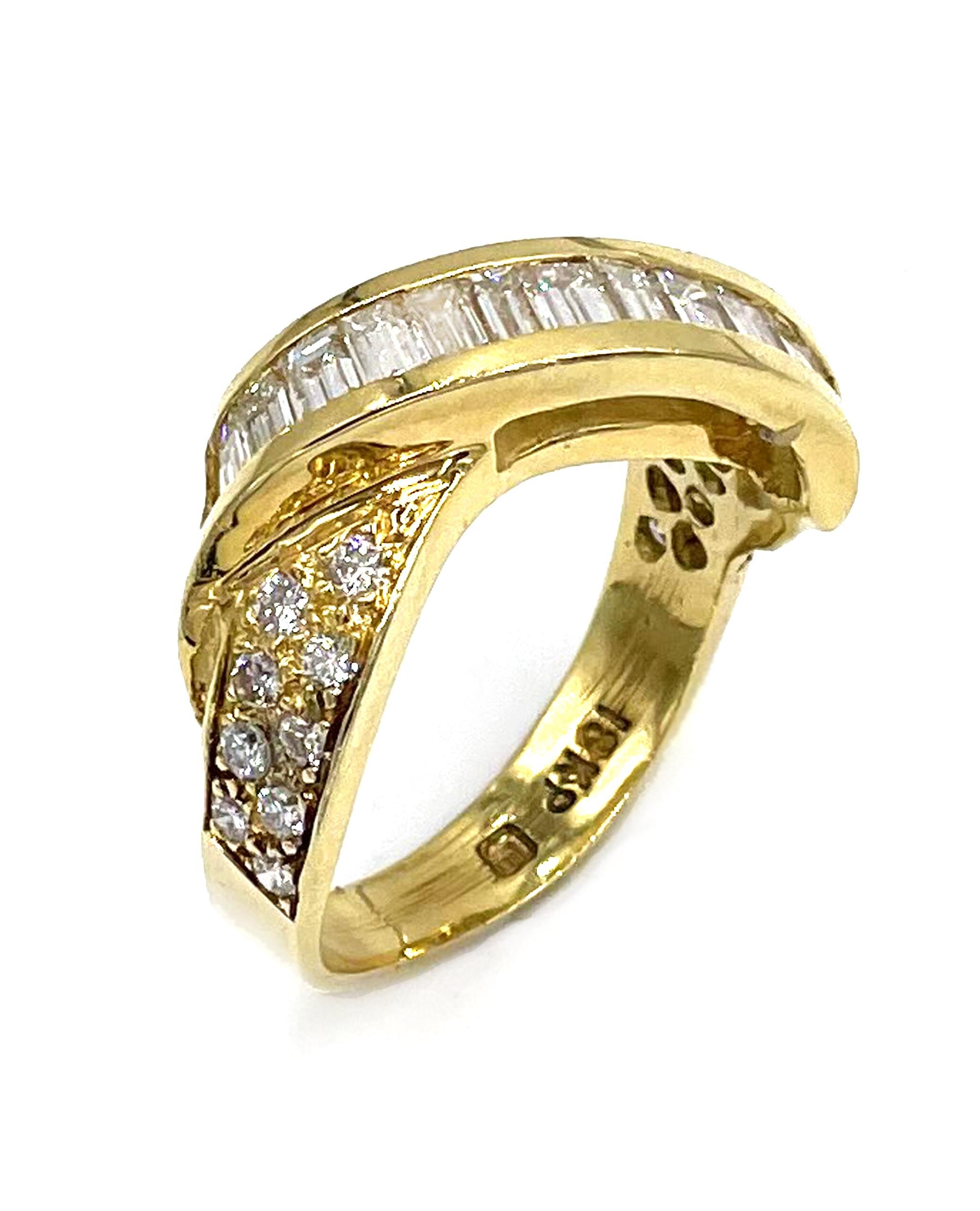 Vintage 18K yellow gold ring with 14 baguette diamonds and 18 round diamonds, all totaling 1.28 carats. G/H color, VS clarity. (Created circa 1985)

-Finger size: 6.25