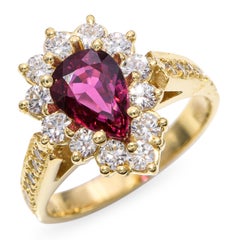 Vintage 18k Yellow Gold Ruby and Diamond Halo Ring