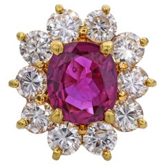 Vintage 18k Yellow Gold Ruby and Diamond Halo Ring