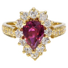 Vintage 18k Yellow Gold Ruby and Diamond Halo Ring