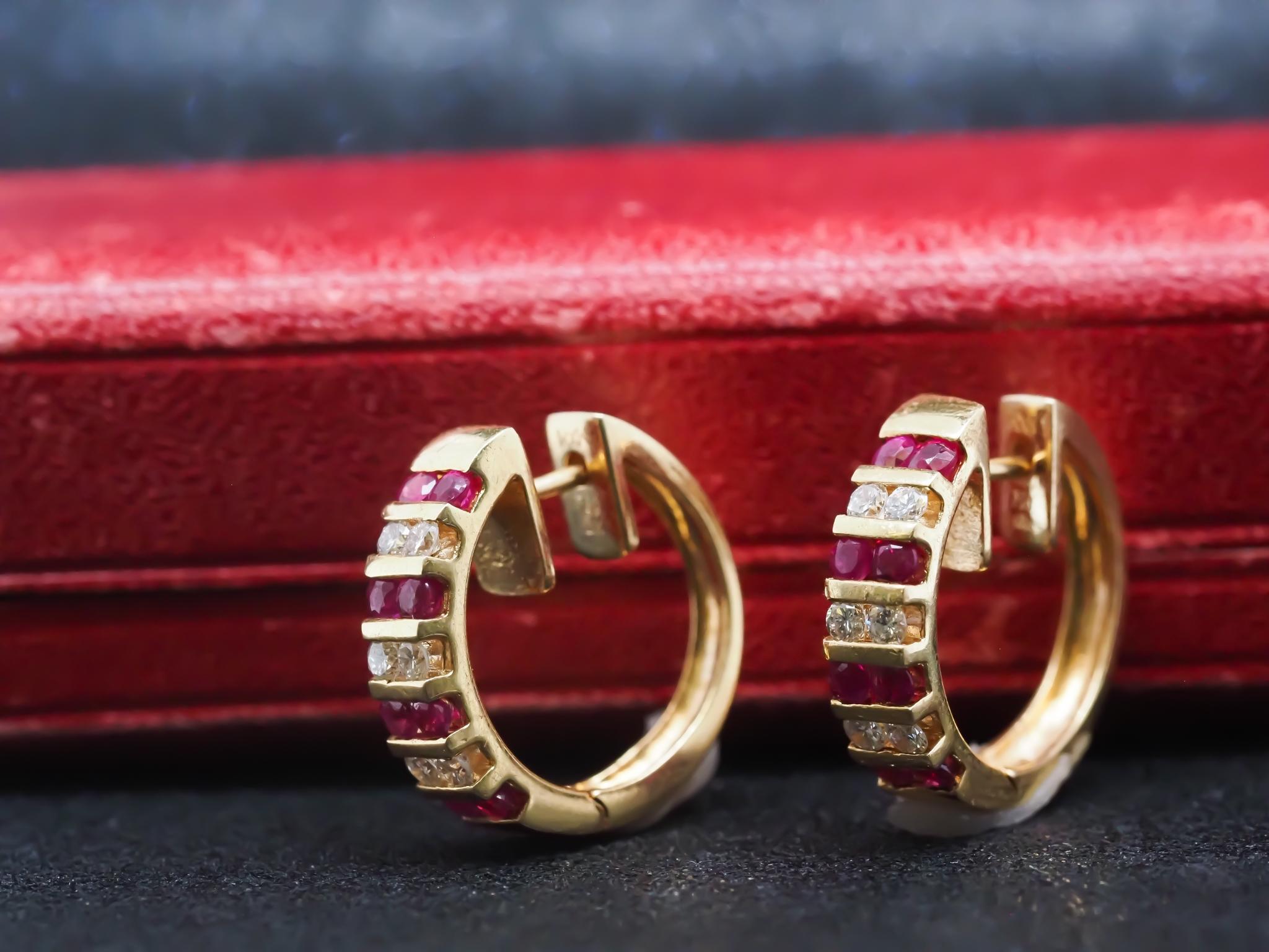 Year: 1990s

Item Details:
Metal Type: 18K Yellow Gold [Hallmarked, and Tested]
Weight: 9.4 grams

Diamond Details: Natural, .65ct total weight, G color, VS Clarity
Ruby Details: Natural, Red, Round Brilliant, .75ct total weight

Measurements:
