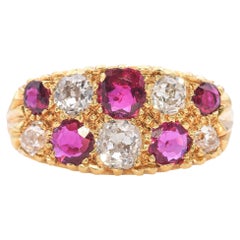 Ring aus 18 Karat Gelbgold mit Rubin und Diamant im alten Minenschliff