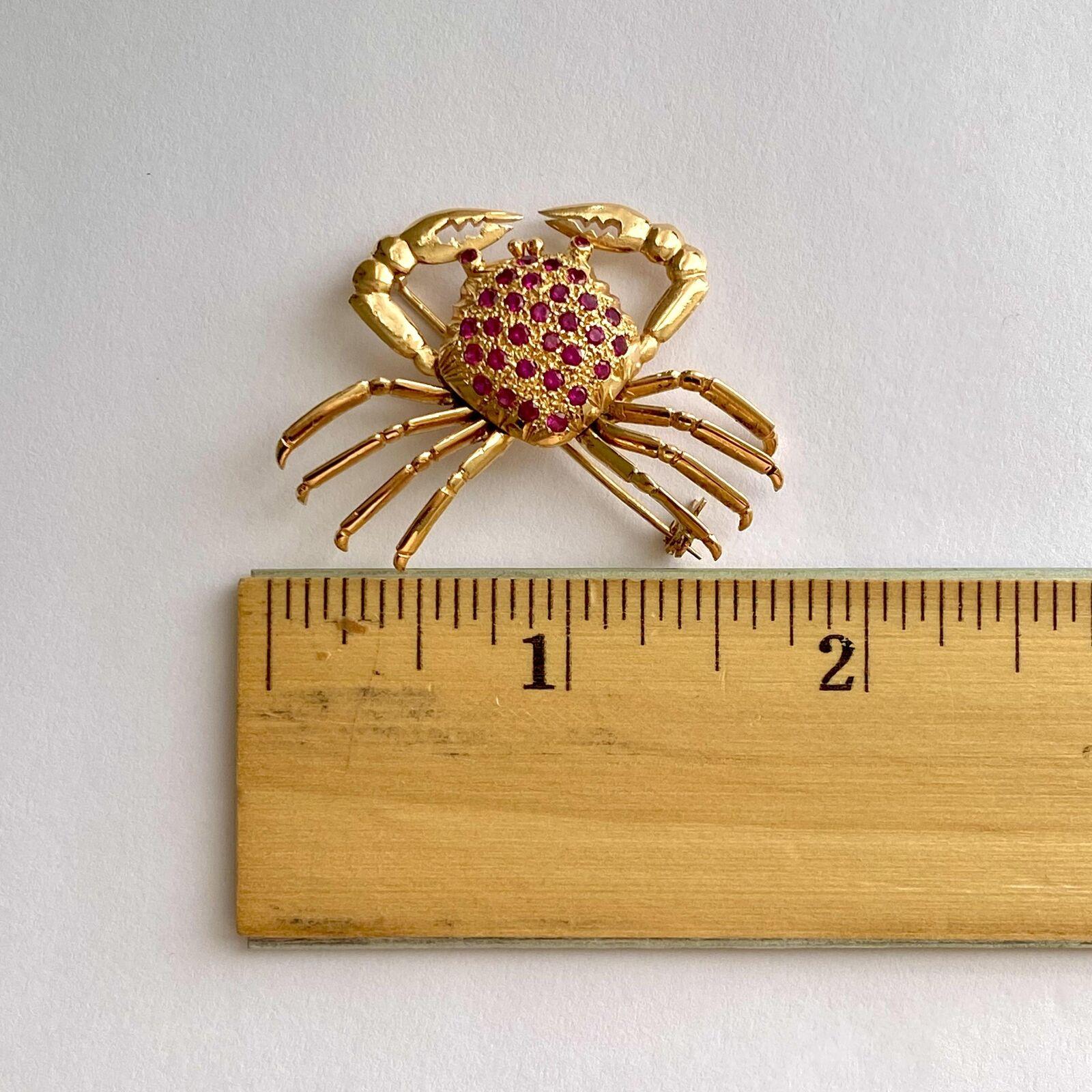 Vintage 18K Yellow Gold Ruby Crab Brooch 9.9G
Specifications:

·        Pre-Owned (Great condition)

·        Metal: 18K Yellow Gold (Au 76.26%)

·        Weight: 9.9Gr

·        Main Stone: Ruby
