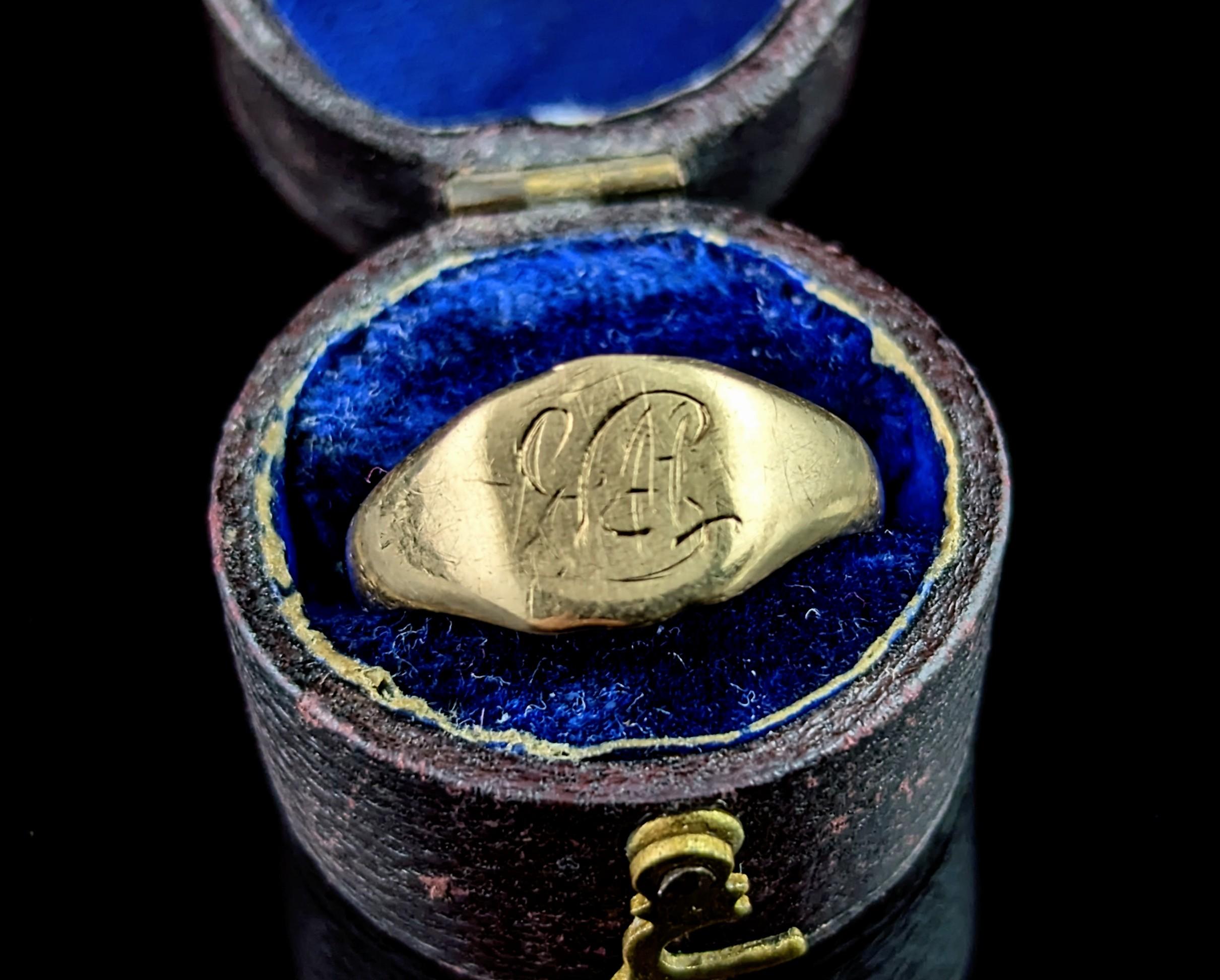If you are looking for a classic vintage signet ring then this one is for you.

A simple yet handsome design, this signet ring has a smooth shield shaped face with a monogrammed design.

It has a smooth band and plain tapered shoulders.

Perfect as