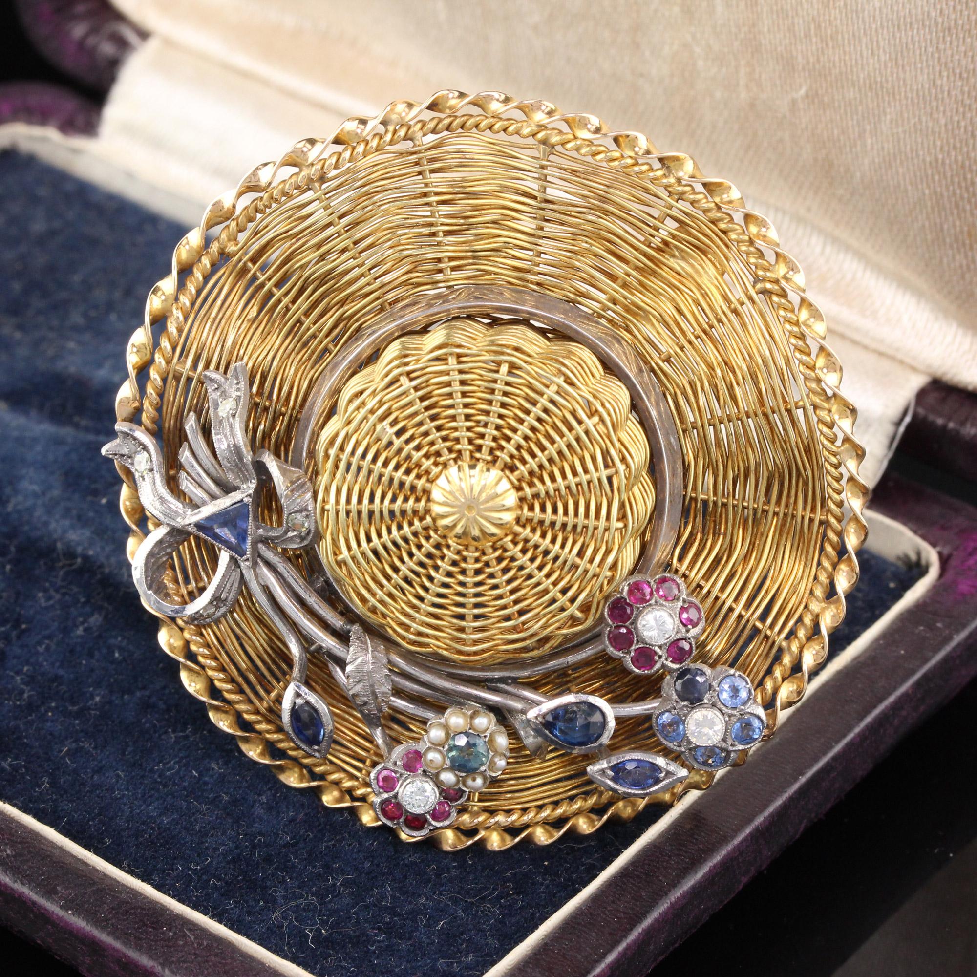 Unique and adorable, this garden party hat brooch is made of woven 18K yellow gold wire. The floral details on top of the hat are made of rubies, sapphires, diamonds and seed pearls set in silver. One of a kind!

Metal: 18K Yellow Gold & Silver