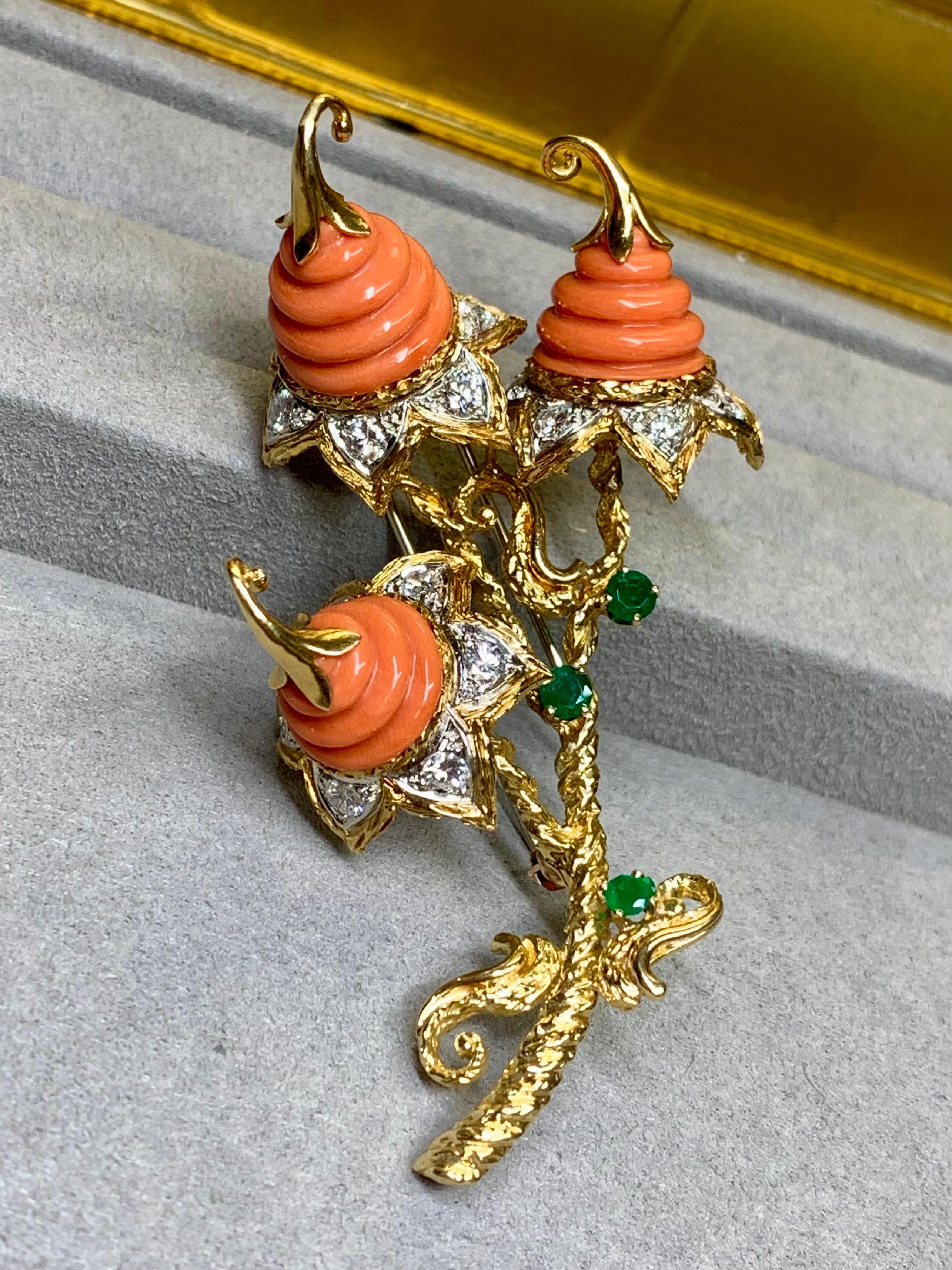 
A stunning and unique one-of-a-kind brooch circa the 1960’s crafted in 18K yellow and white gold and set with approximately 2.16ctw in G-H color Vs1-2 clarity round diamonds as well as .45ctw in natural, bright green emeralds. The incredibly unique