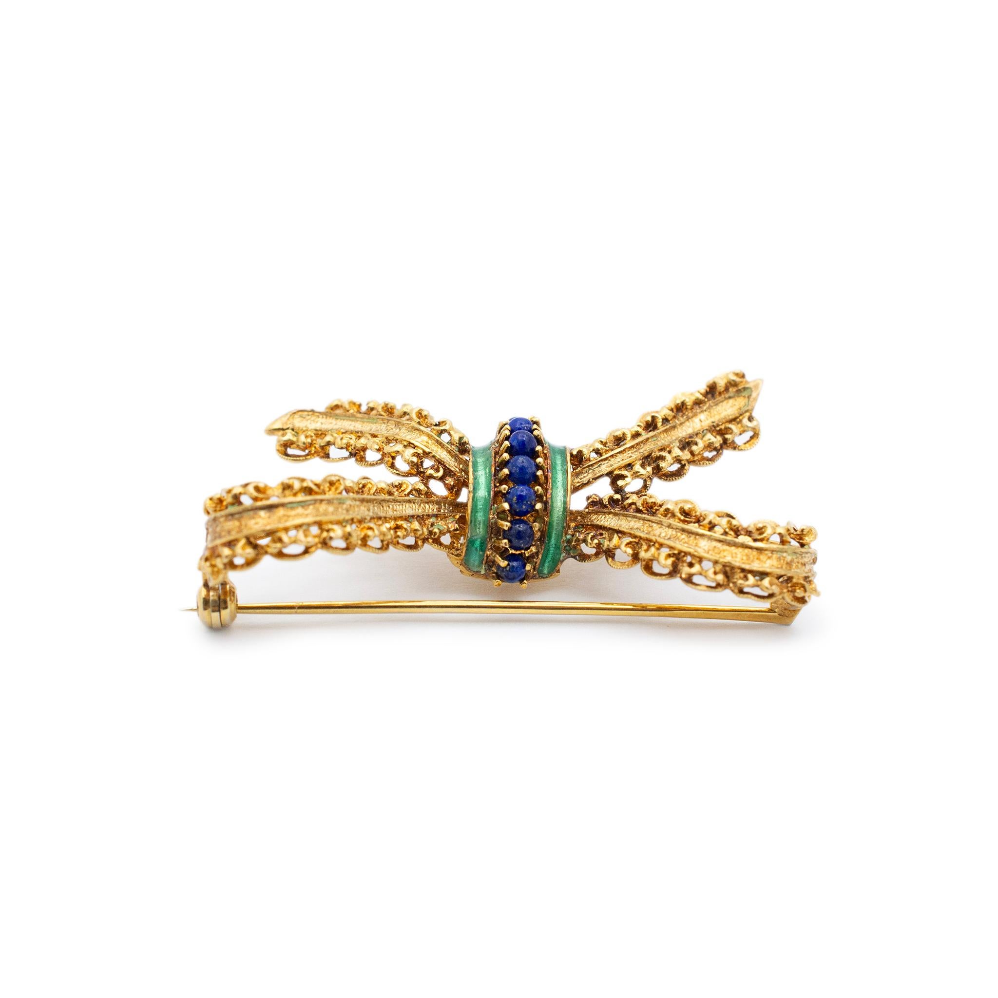 Metal Type: 18K Yellow Gold

Length: 0.75 inches

Width: 1.75 inches

Weght: 8.34 grams

Handmade 18K yellow gold bow lapis lazuli vintage brooch. The metal was tested and determined to be 18K yellow gold. Engraved with 