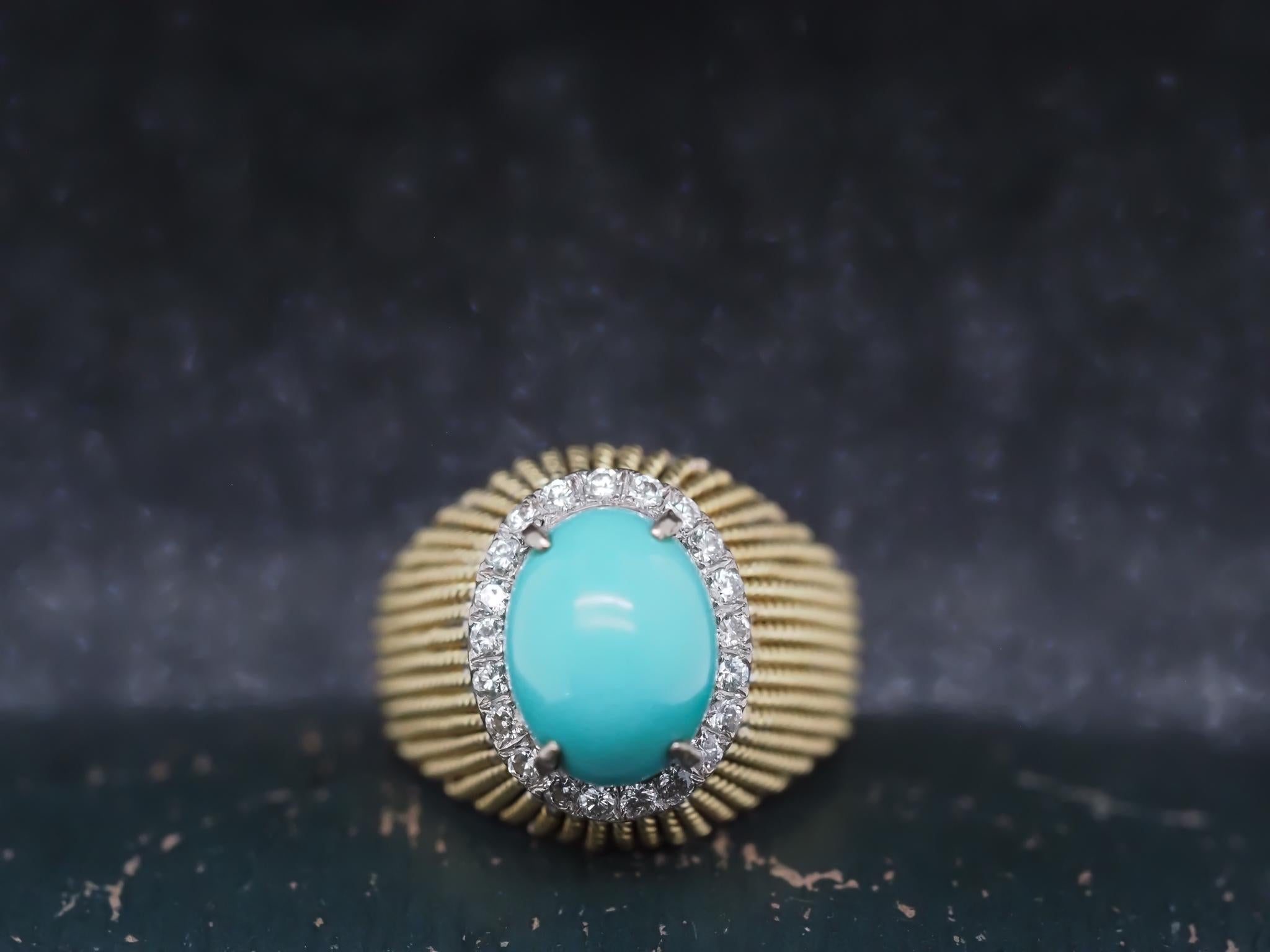 Year: 1960s

Item Details:
Ring Size: 9 (Sizable)
Metal Type: 18K Yellow Gold [Hallmarked, and Tested]
Weight: 13.8 grams

Diamond Details: Round Brilliant, .50ct total weight, G Color, VS Clarity

Turquoise Details: 12.5mm x 9.5mm, Light Blue,