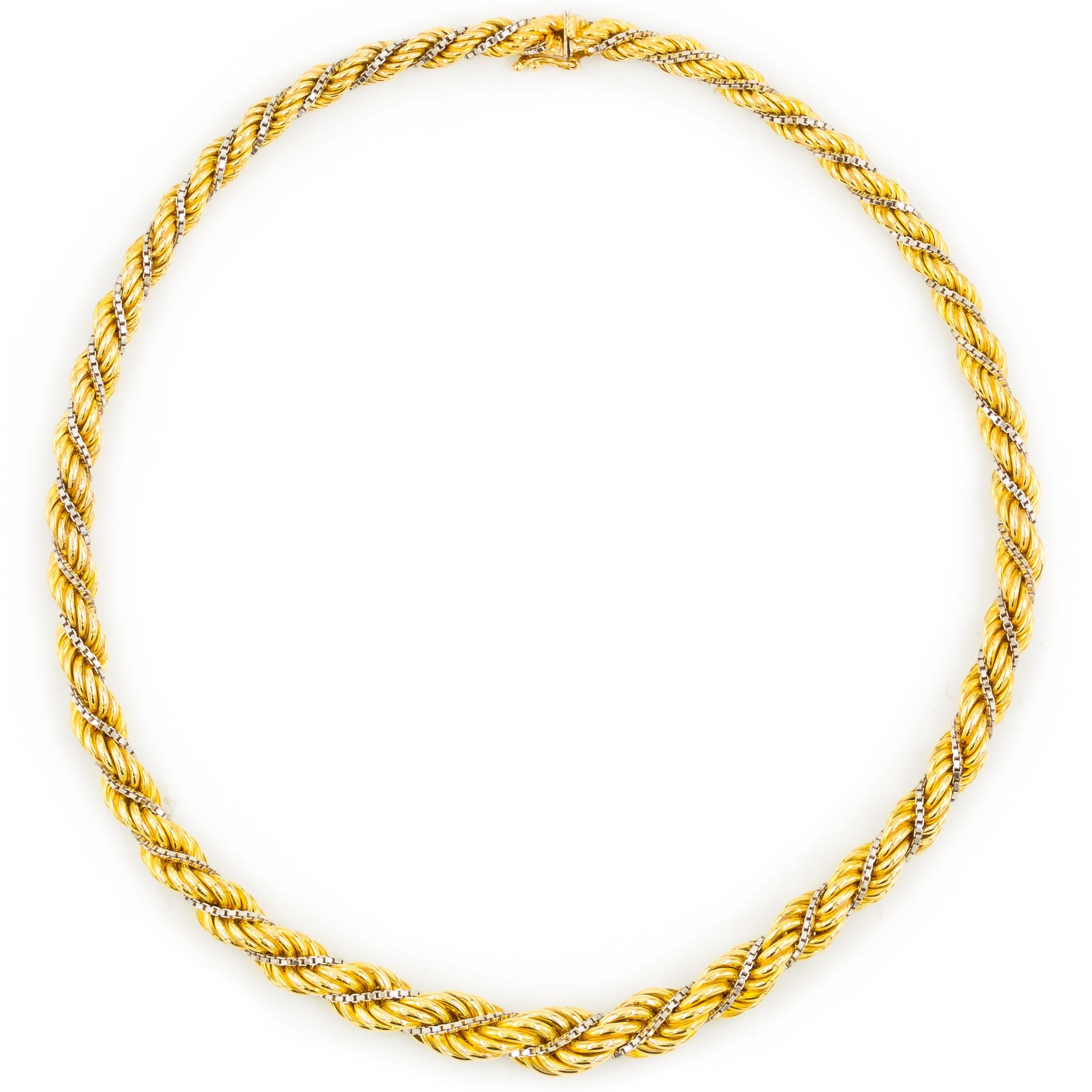 VINTAGE GOLD GRADUATED-TWIST ROPE NECKLACE
18k yellow gold with 14k white gold inner chain  44.3 grams total weight  17 3/8