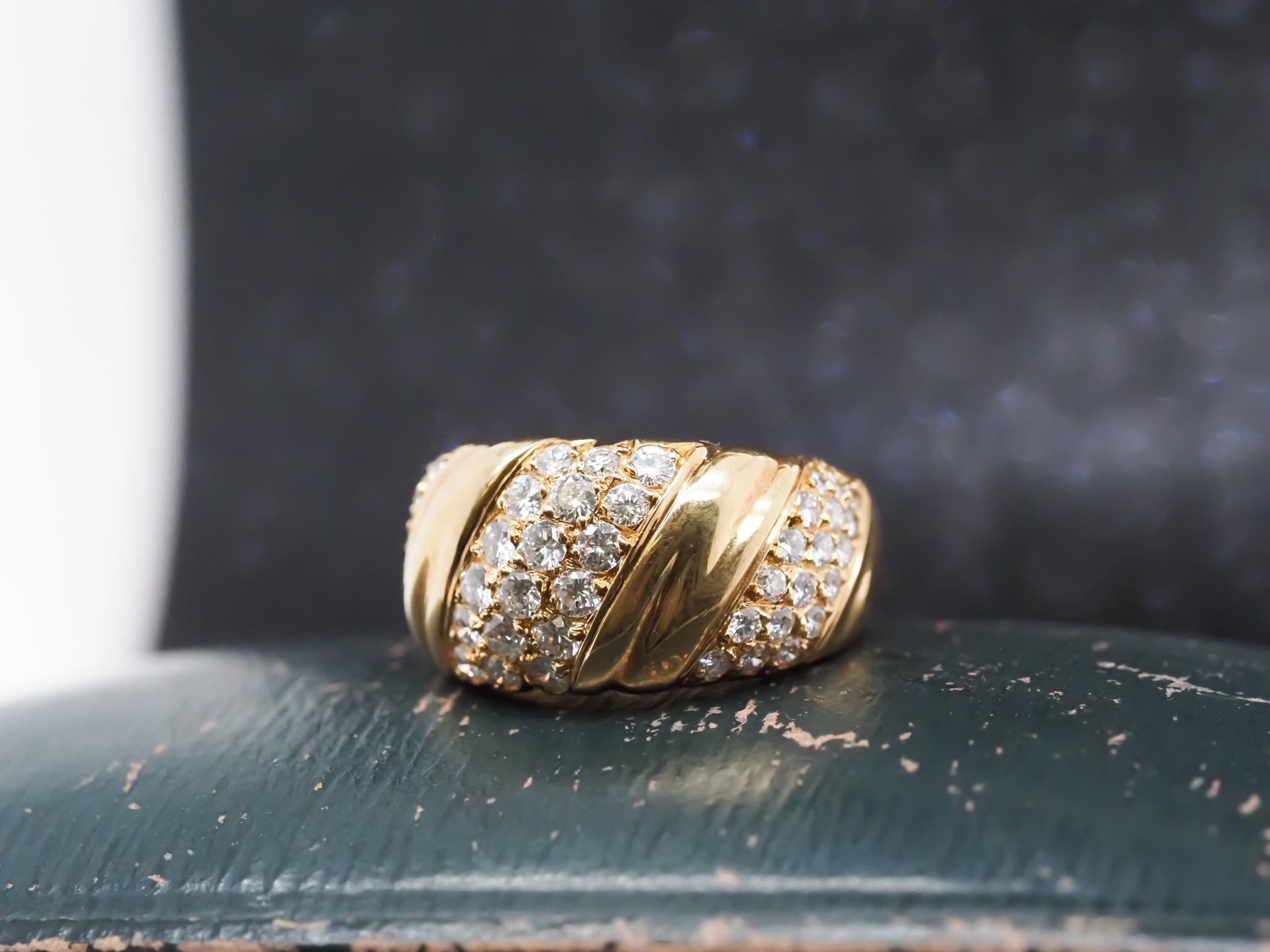 Vintage 18K Yellow Gold Van Cleef & Arpels Diamond Swirl Ring

Year: 1970s

Item Details:
Ring Size: 6 (Sizable)
Metal Type: 18K Yellow Gold [Hallmarked, and Tested]
Weight: 8.8 grams

Stamps: French Import Stamp on the outer shank, inner shank