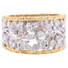 Bague vintage en or jaune et blanc 18 carats avec diamants taille ronde de 0,60 carat