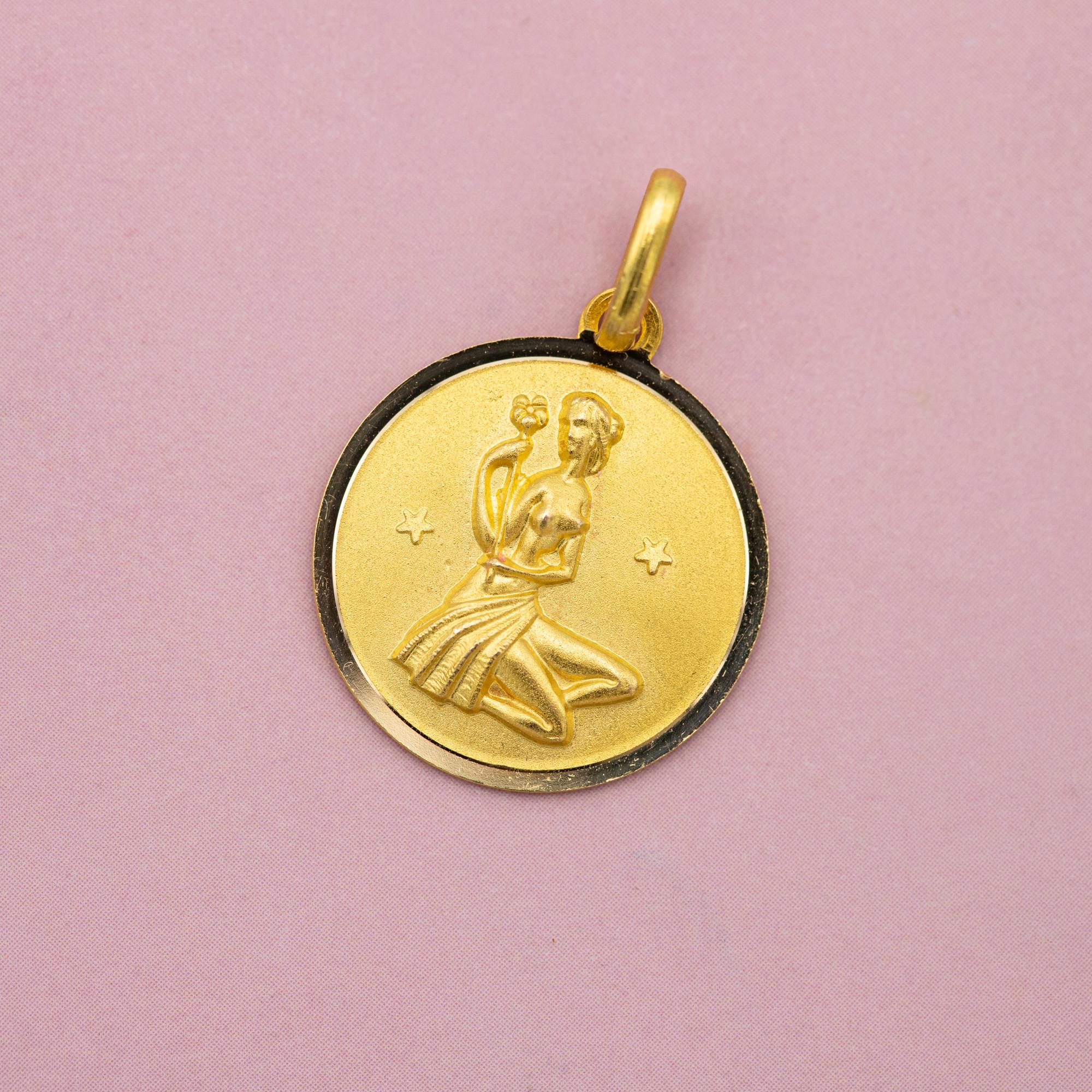 For sale is this vintage charm depicting Virgo, the sixth astrological sign in the zodiac. This Constellation Star Sign Pendant is associated with the birth dates between 23 August and 23 September. This 18 ct gold charm is marked with a 750 mark.