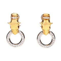 Boucles d'oreilles panthère vintage en or bicolore 18 carats, diamants et rubis