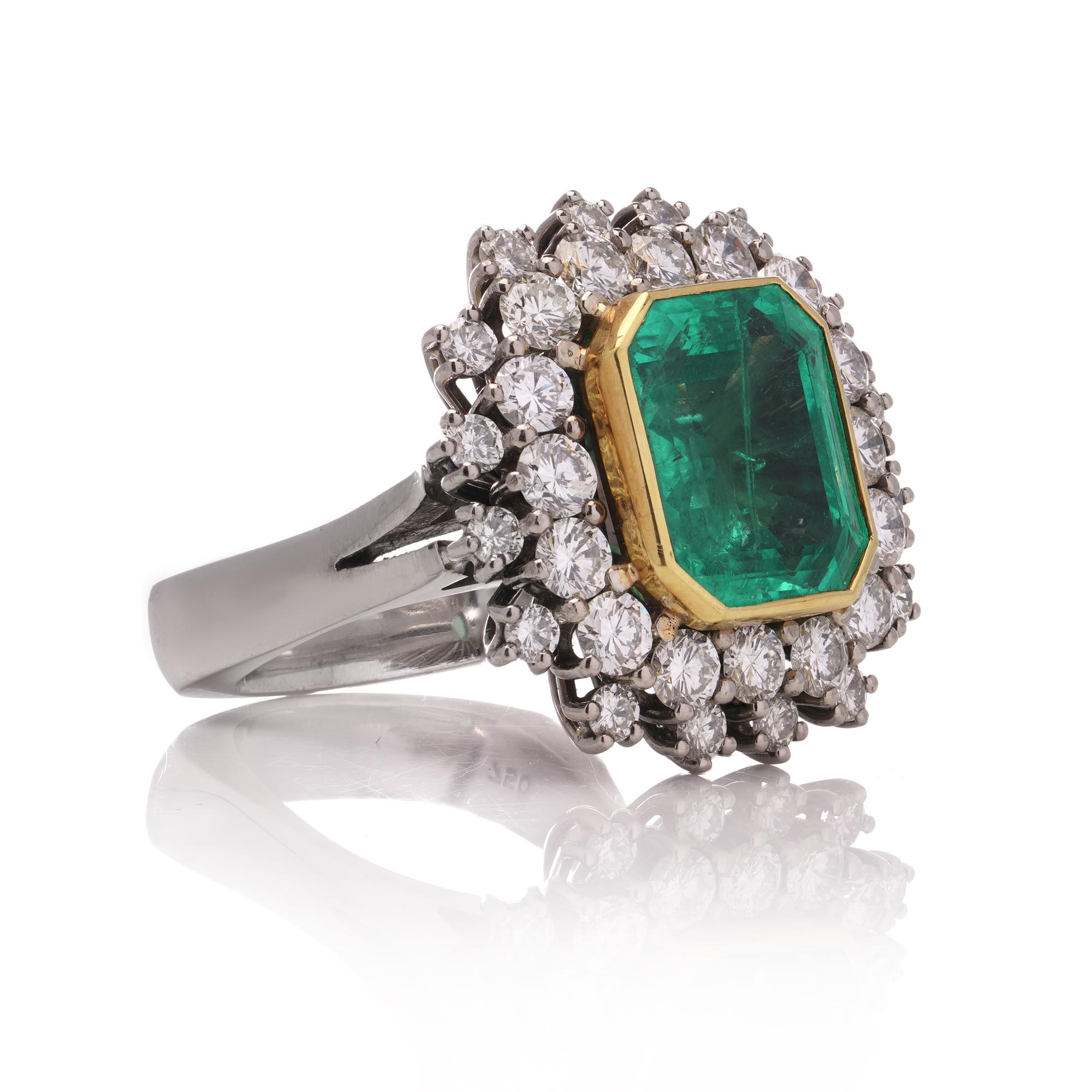 Emerald Cut Vintage 18kt. gold 8.50 carats of Natural Colombian emerald cluster ring  For Sale