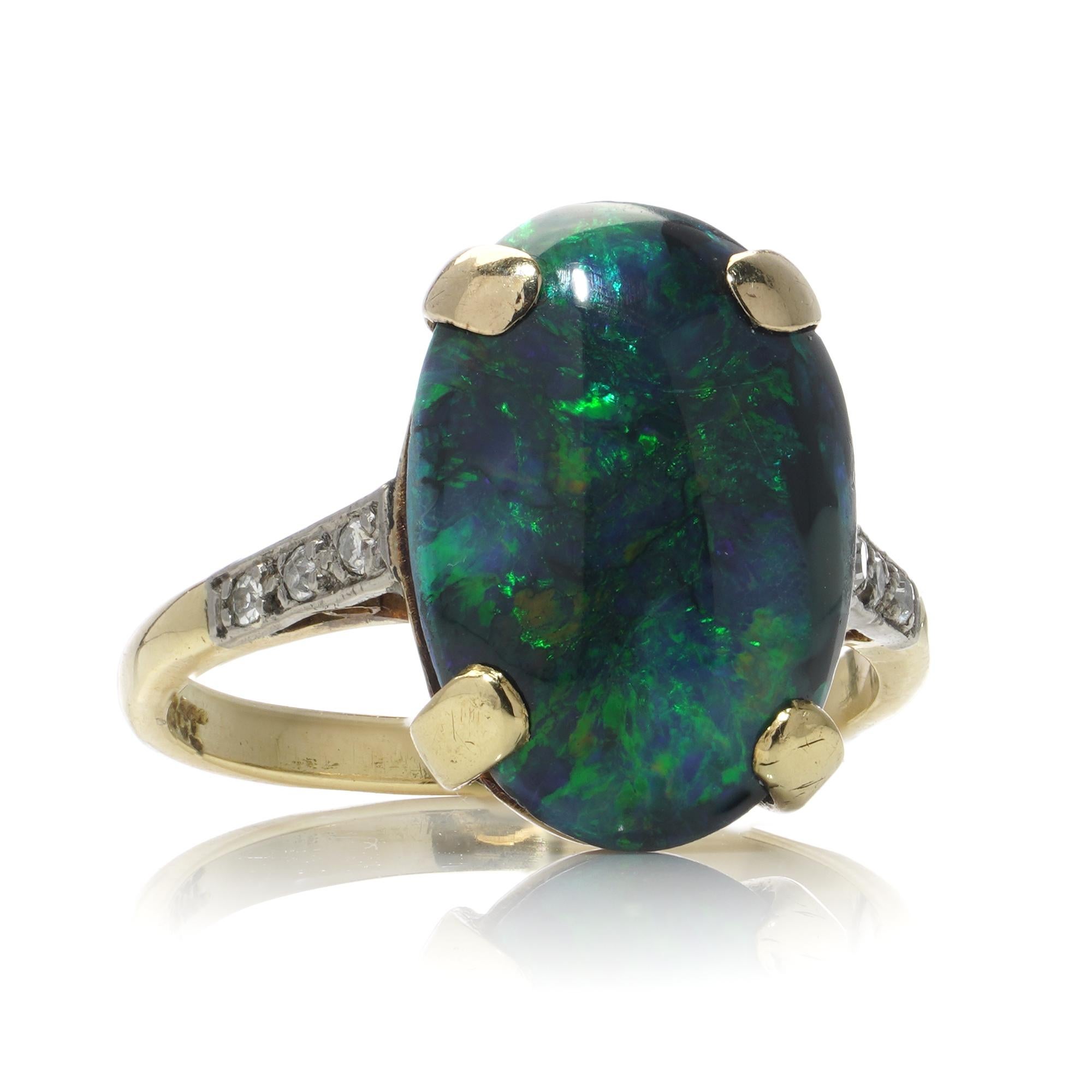 Vintage 18kt gold black opal and diamond ring. For Sale 1
