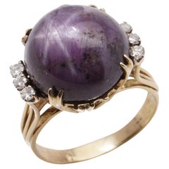 Vintage 18kt. gold star ruby cabochon ladies ring